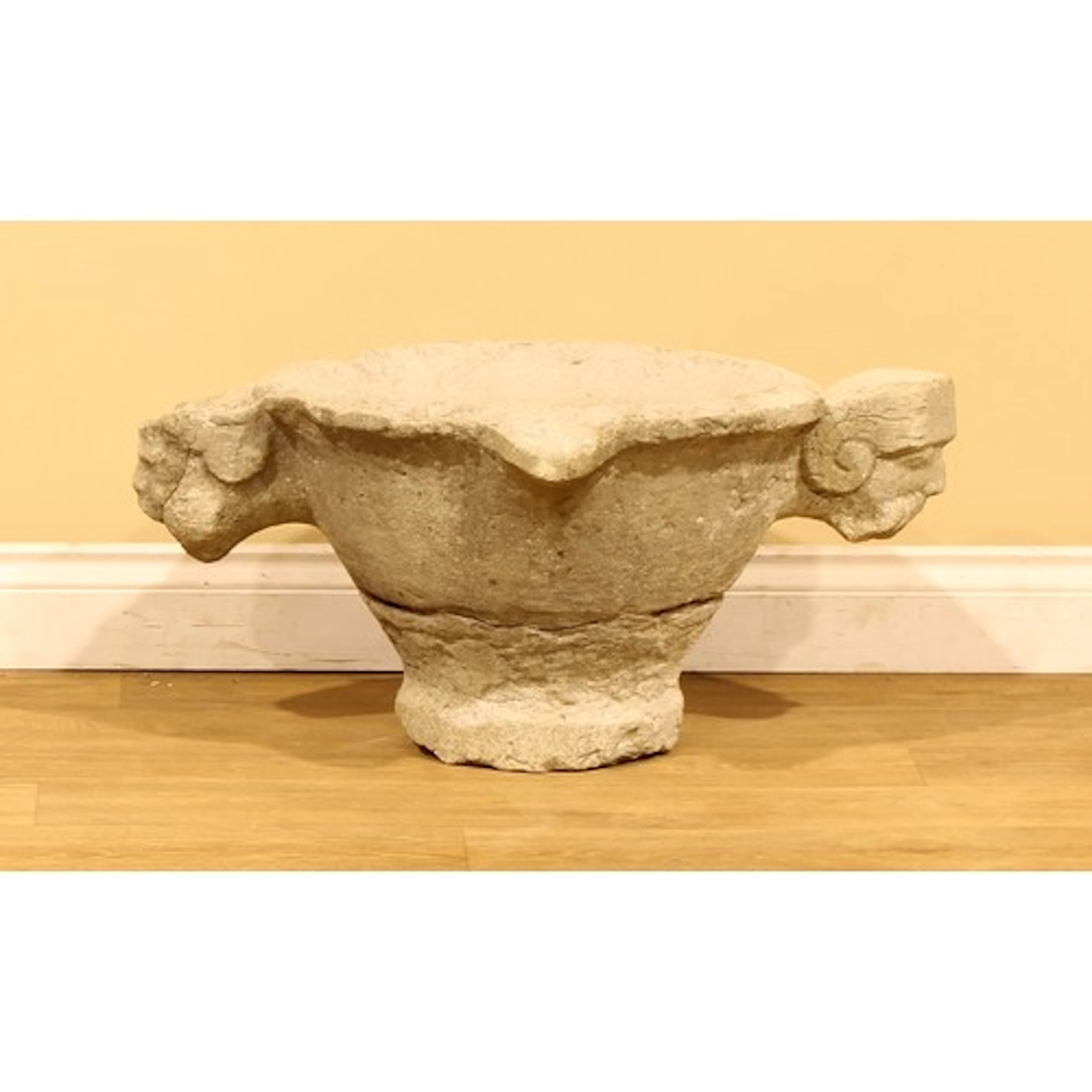 An Anglo-Norman limestone holy water basin or font, of lavab...