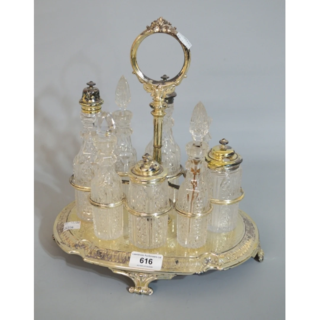 Victorian oval silver plated condiment stand, with eight cut...