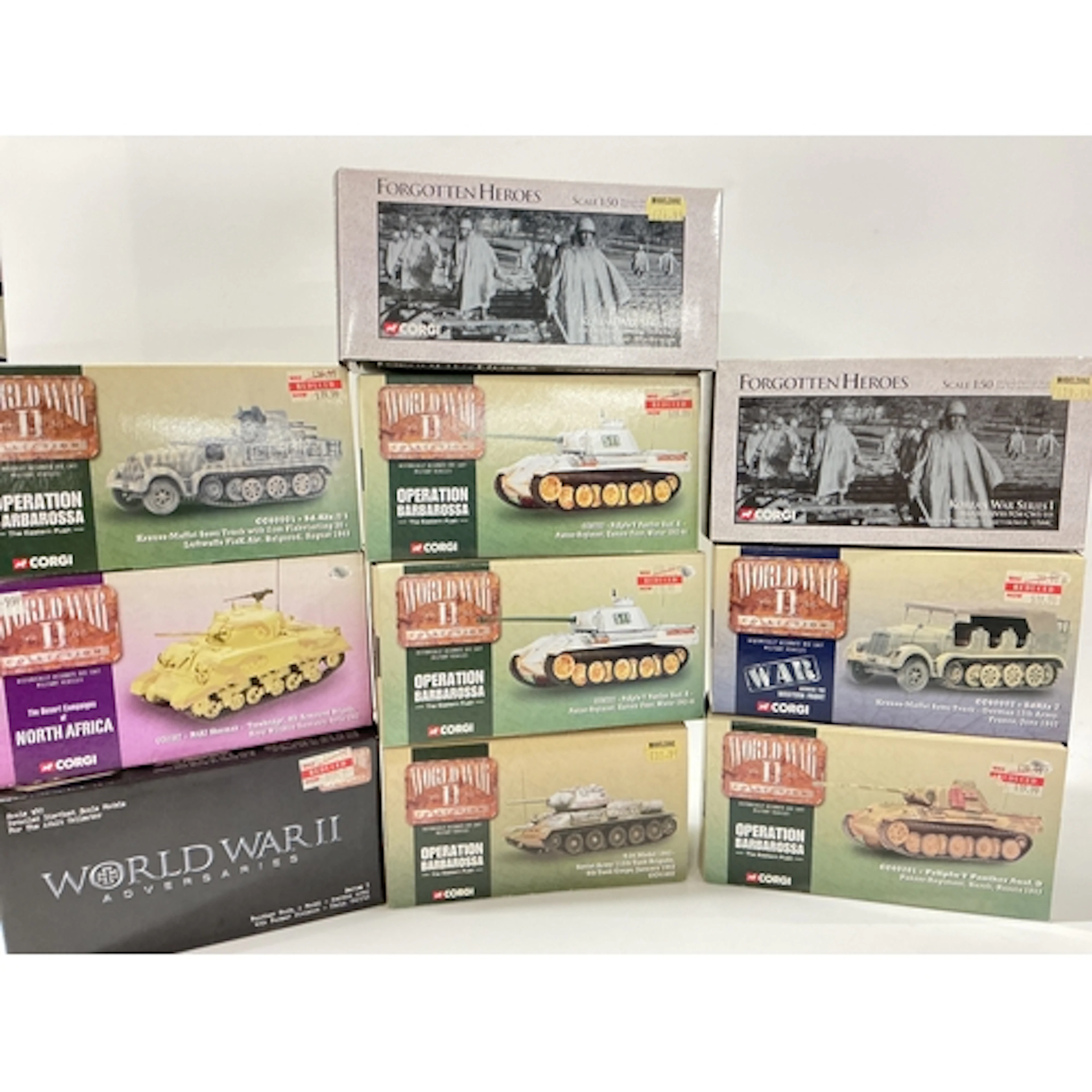 A Collection Of Boxed Corgi WWII Tanks And Semi-Tracks. No R...