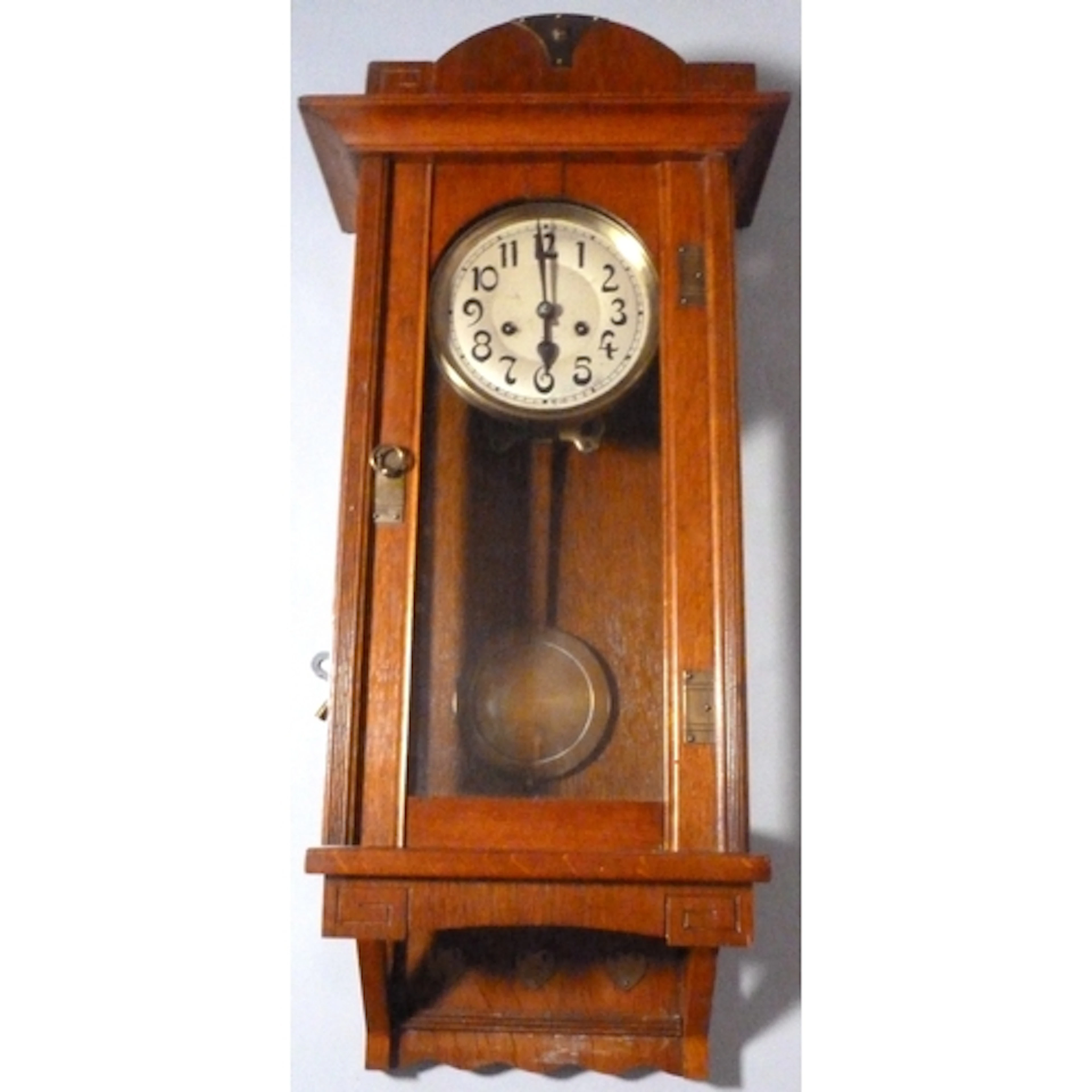 Arts & Crafts oak cased wall clock, with twin train move...