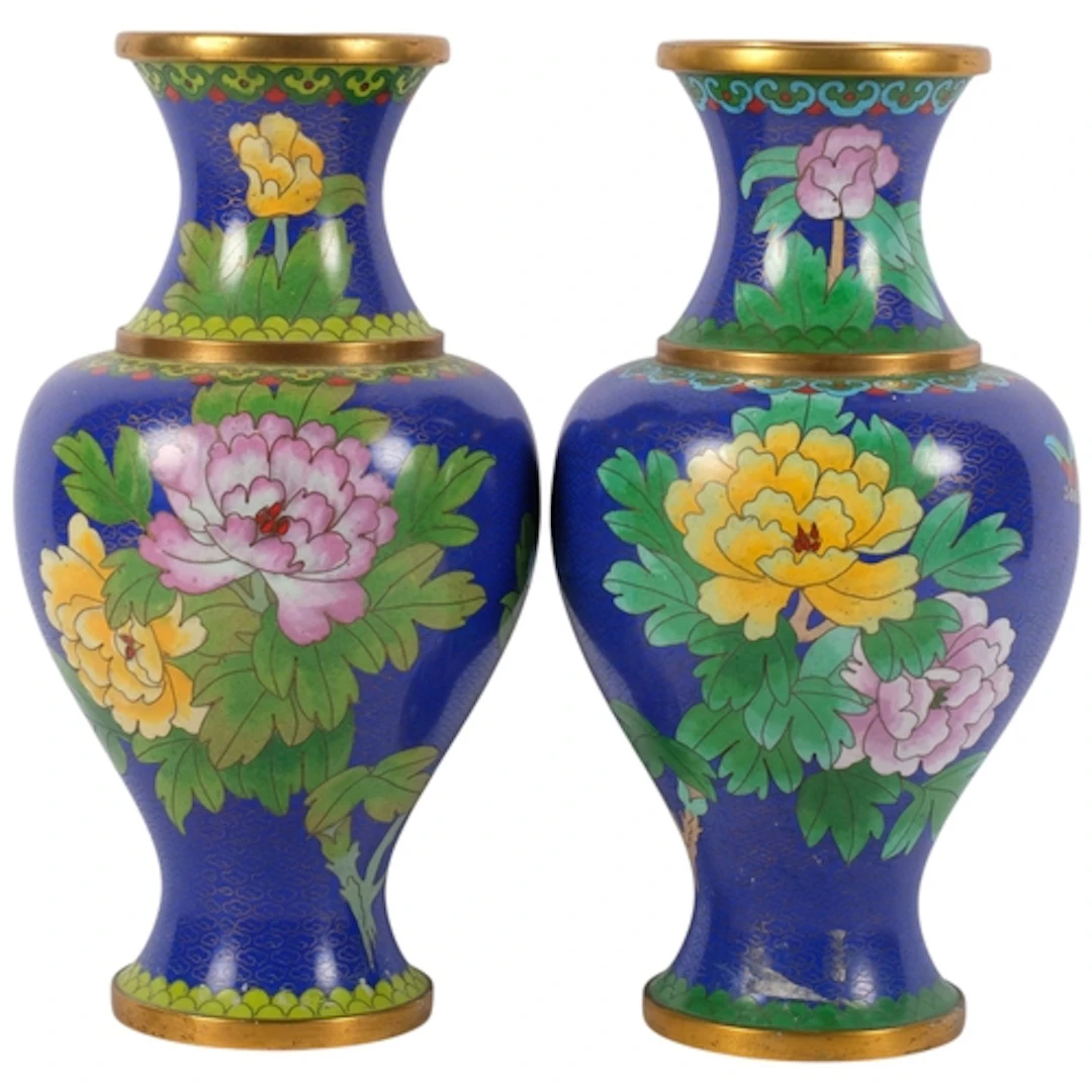 A pair of Oriental blue ground cloisonne vases, with floral ...