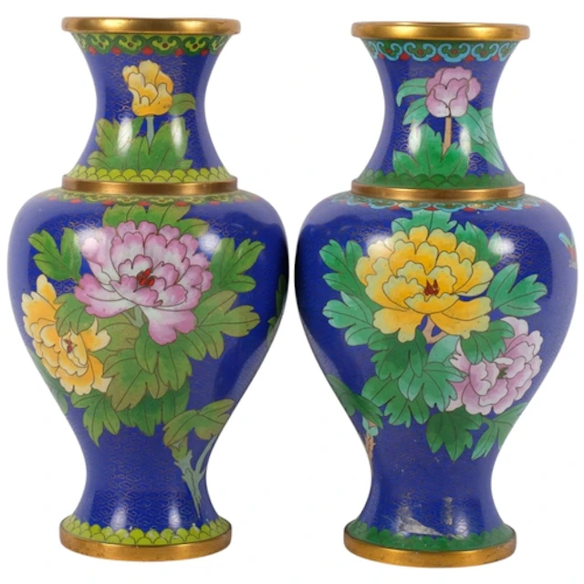 A pair of Oriental blue ground cloisonne vases, with floral ...