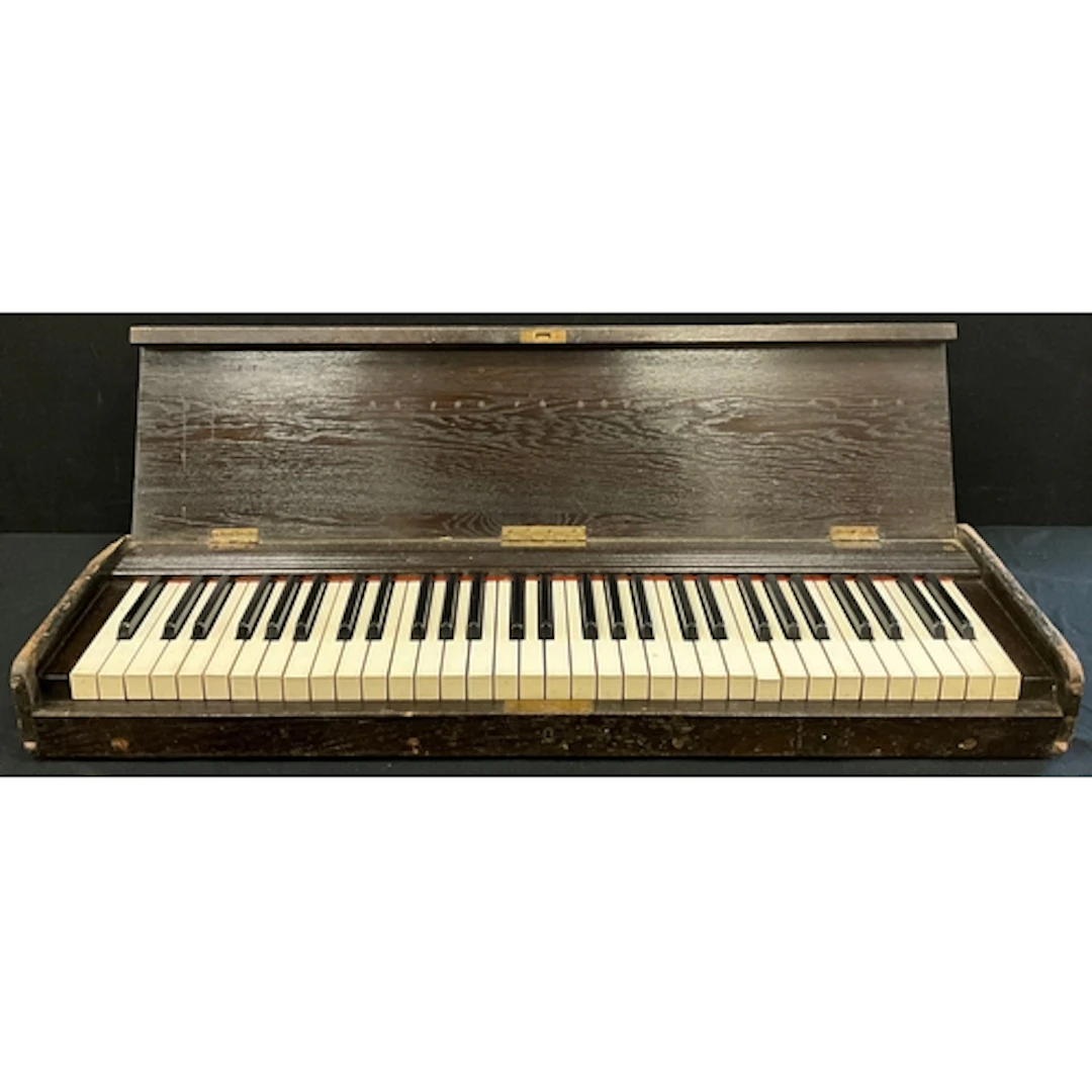 A late 19th century portable organ keyboard, likely detached...