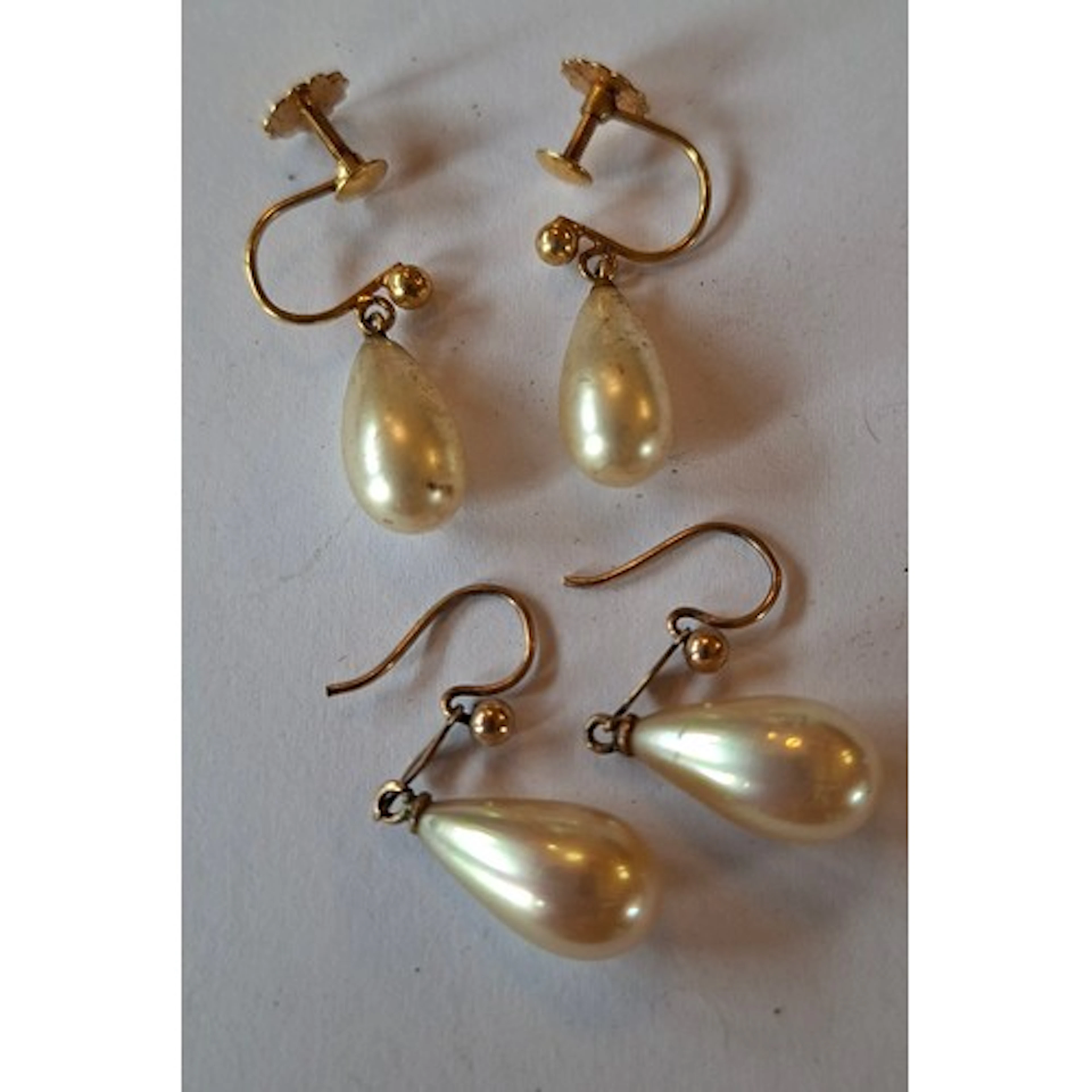 A pair of 9ct gold and simulated pearl drop earrings togethe...