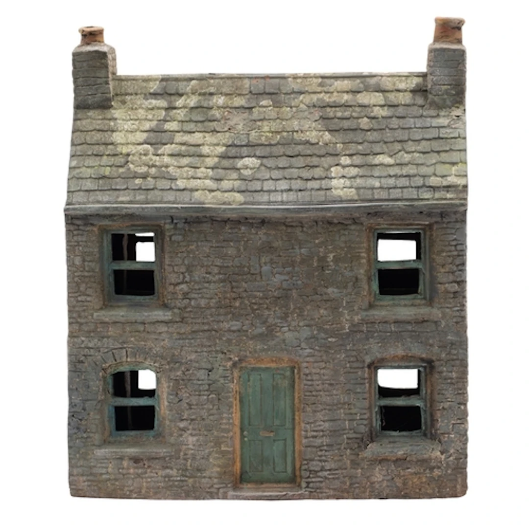 A painted terracotta model of a stone house, early 20th cent...