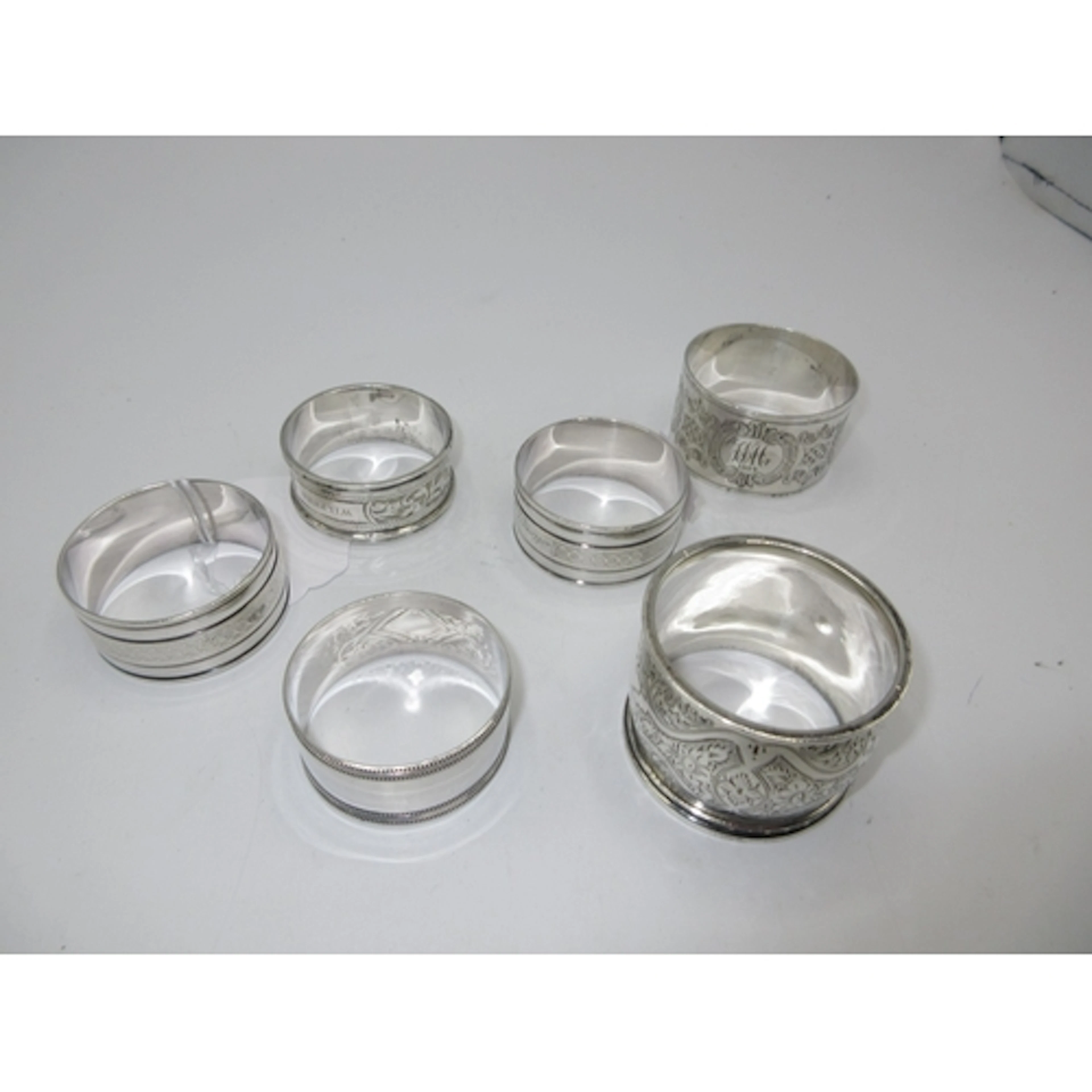 Six Silver Napkin Rings, 156g total