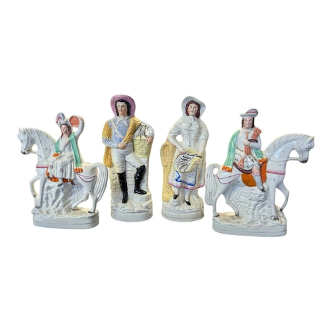 A collection of four 19th century Victorian Staffordshire Fl...