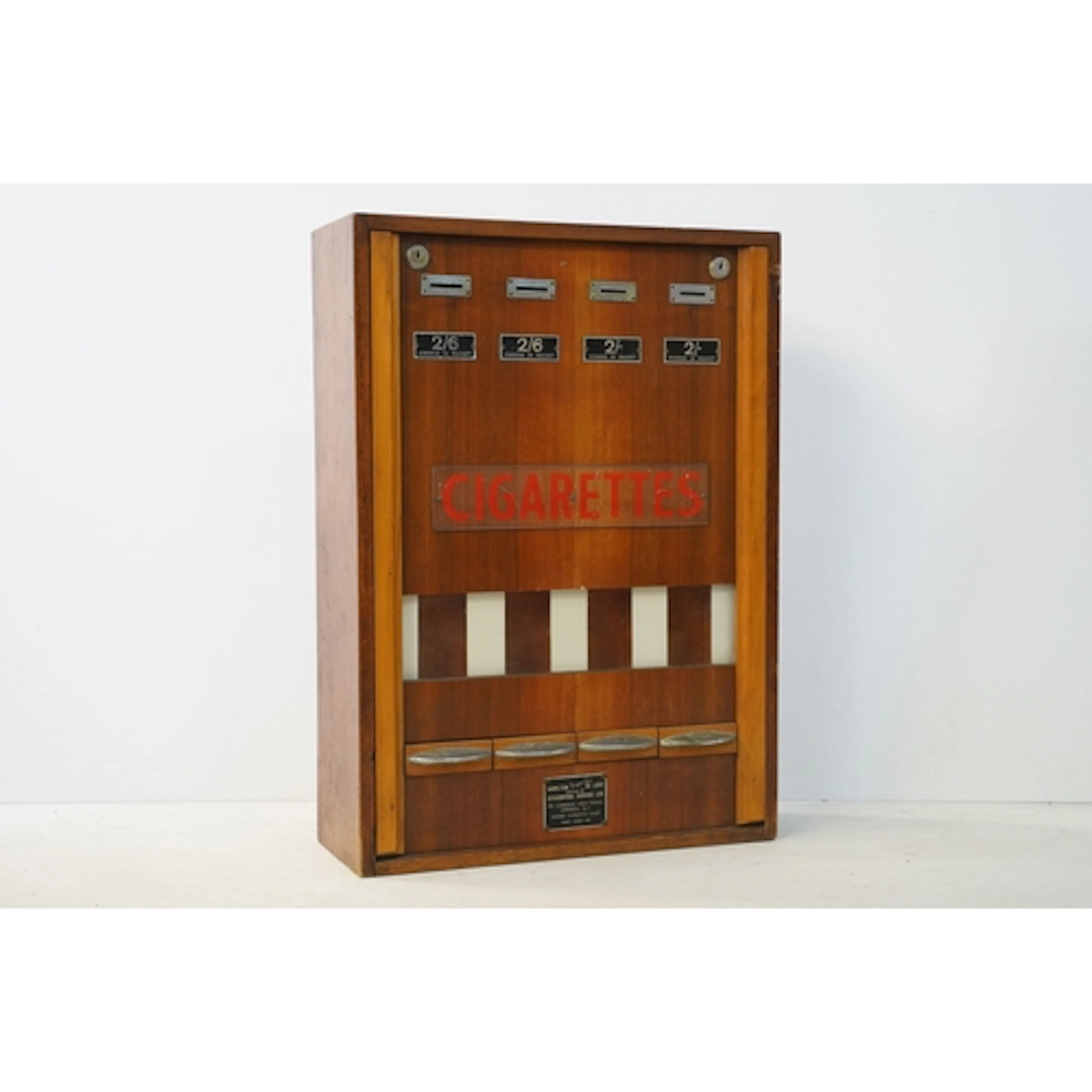 Mid 20th century cigarette vending machine, having 'CIGARETT...