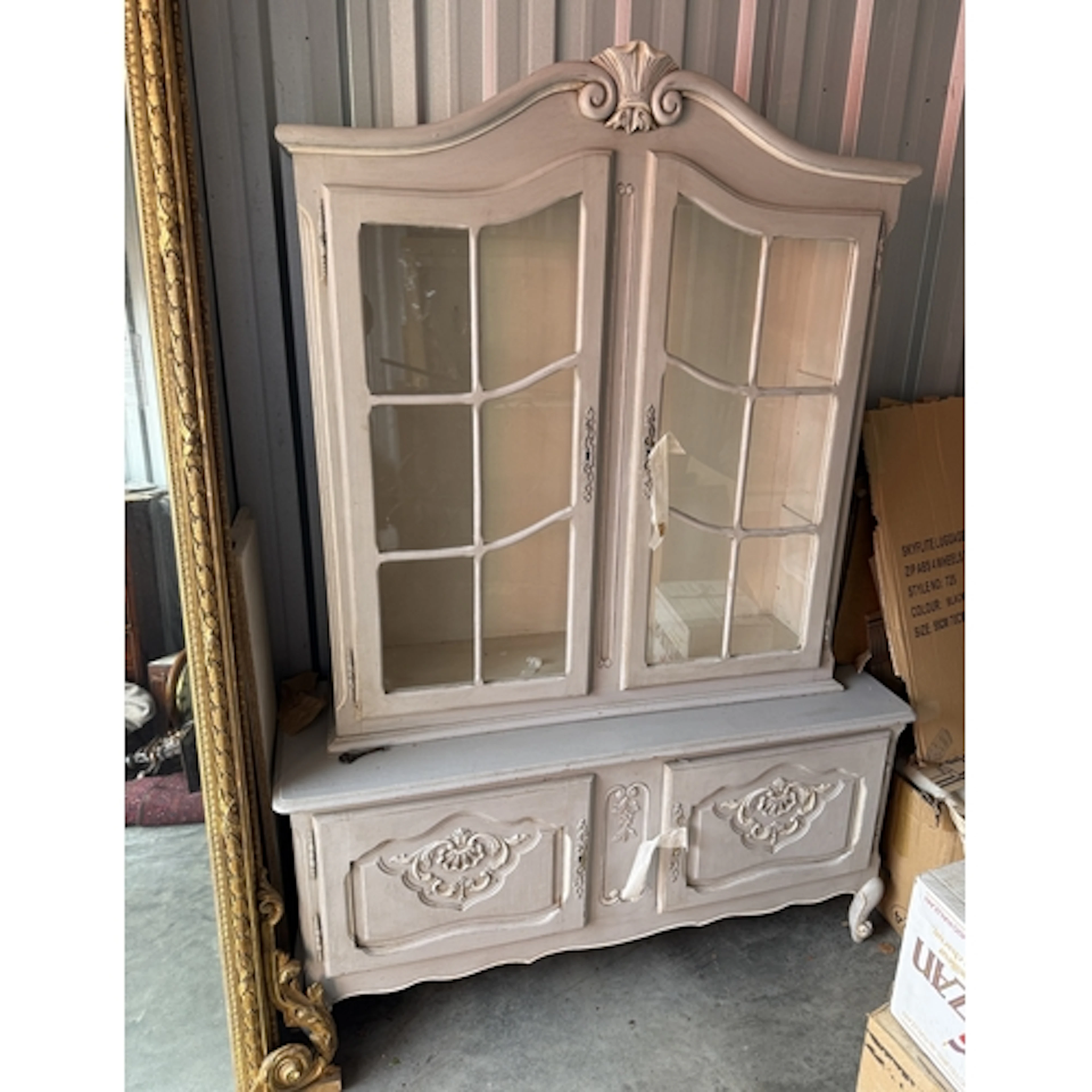 A GREY PAINTED DISPLAY CABINET In two sections. Together wit...