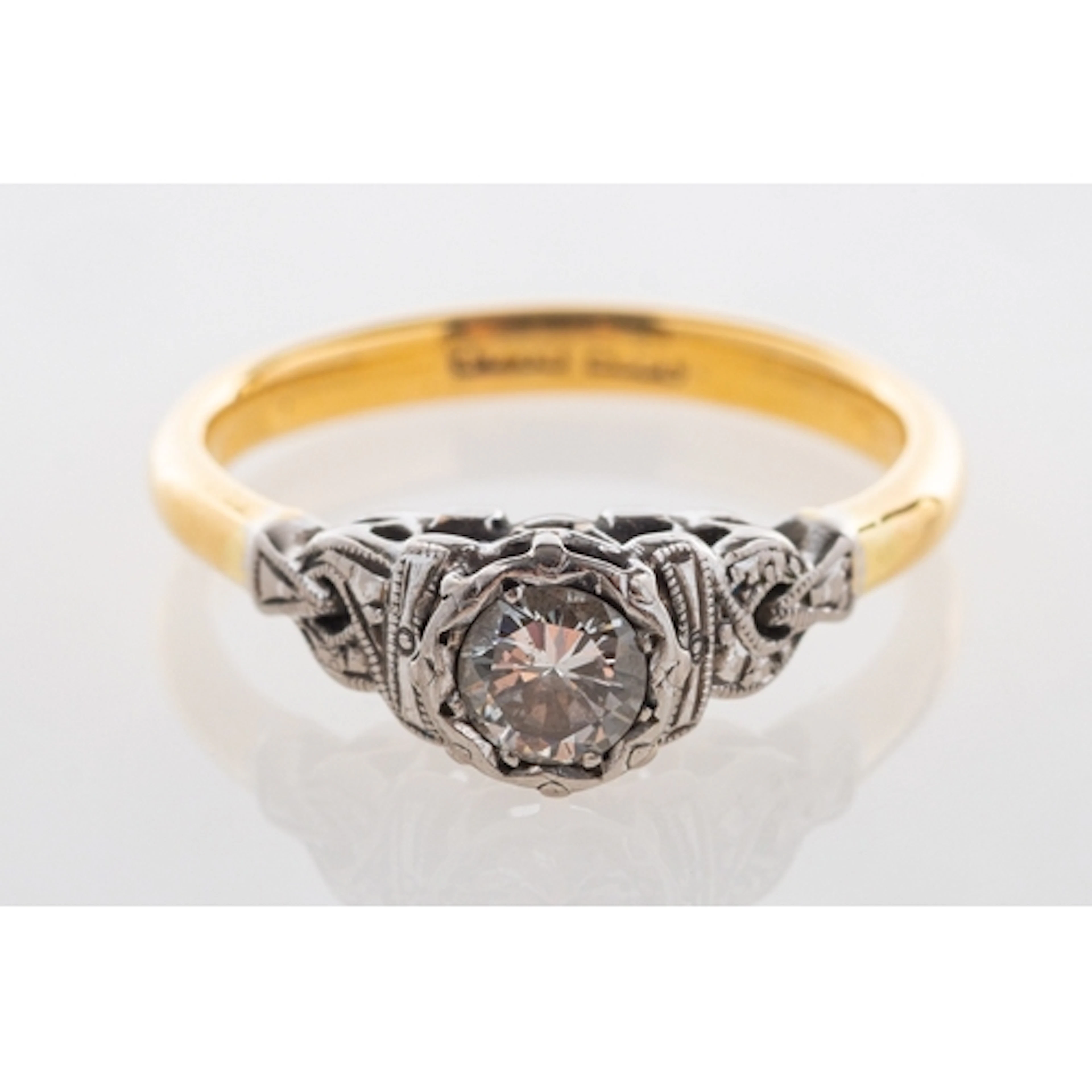 A diamond solitaire ring, 18ct yellow metal marked 18ct, PLA...
