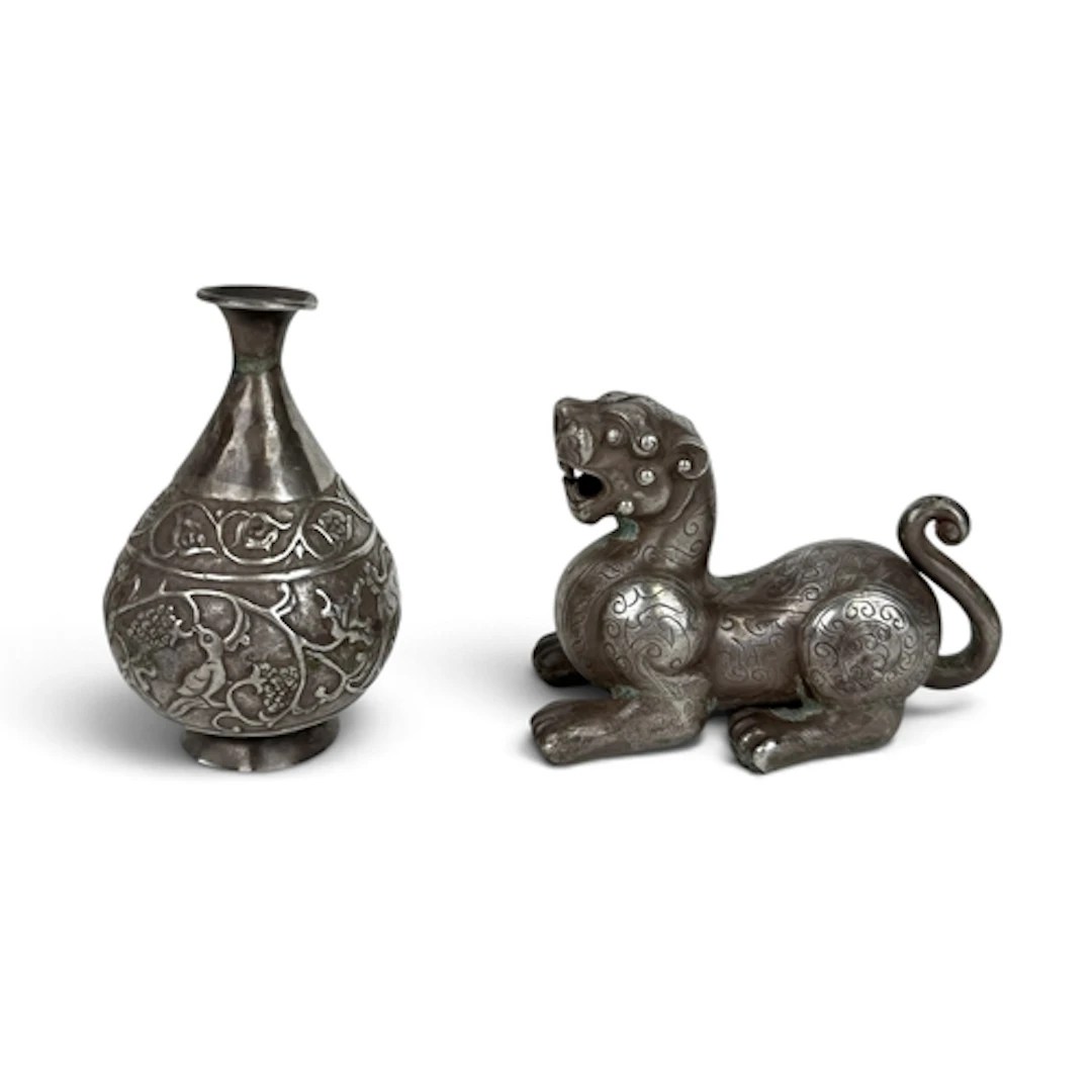 AN EARLY 20TH C ARCHAIC-STYLE CHINESE SILVER LION AND VASE...