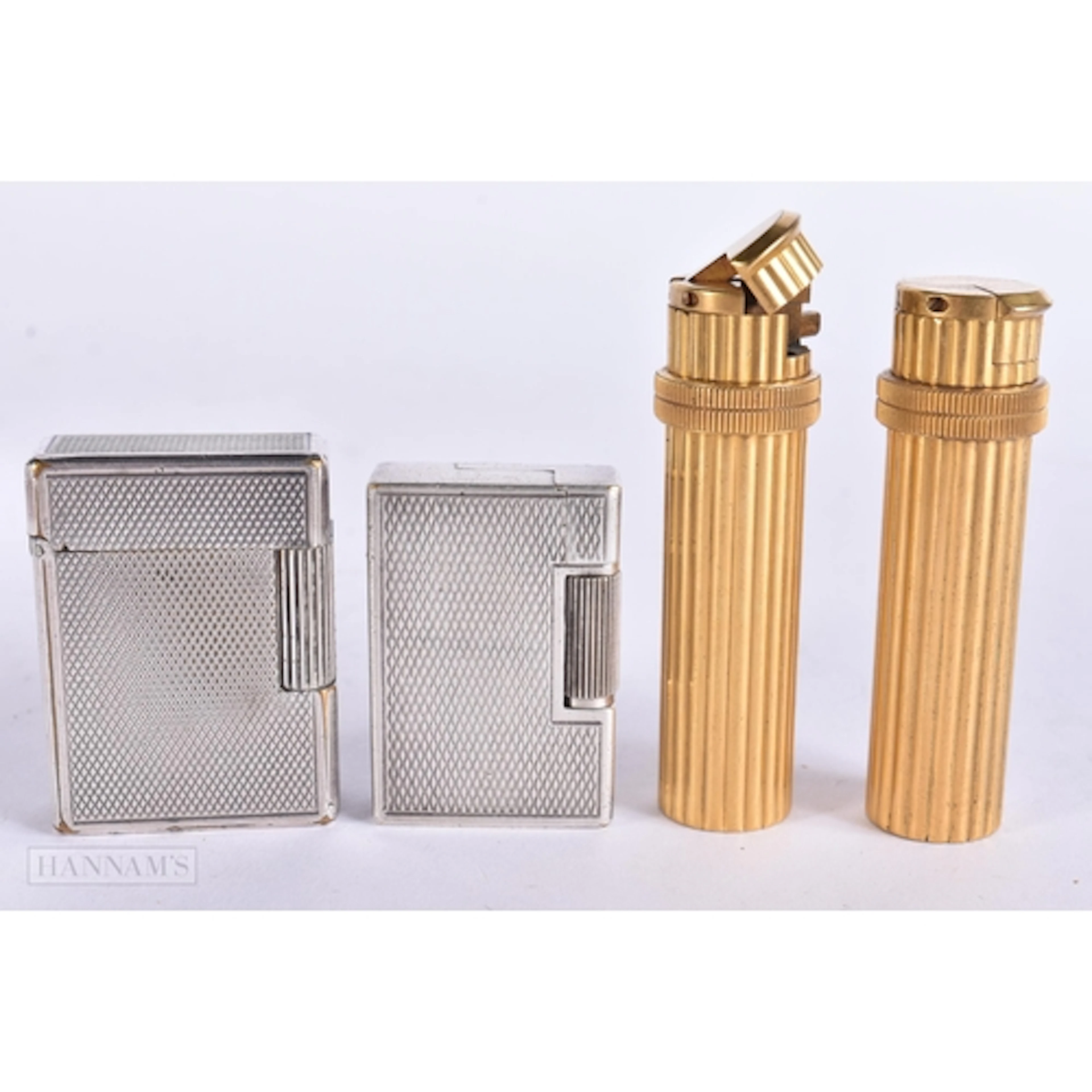 FOUR VINTAGE LIGHTERS including St Dupont. (4)