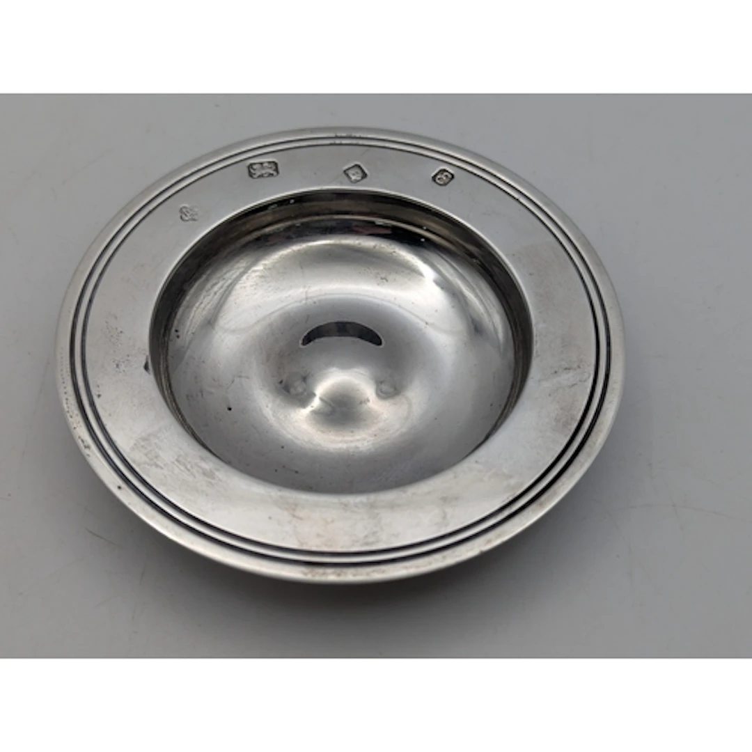 A silver Armada style dish hallmarked London 1979, 11cm diam...