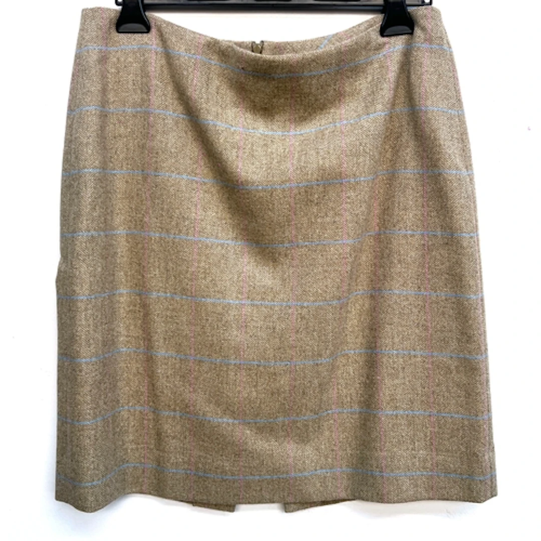 A 'Really Wild' wool skirt in a beige, pink and blue tartan,...