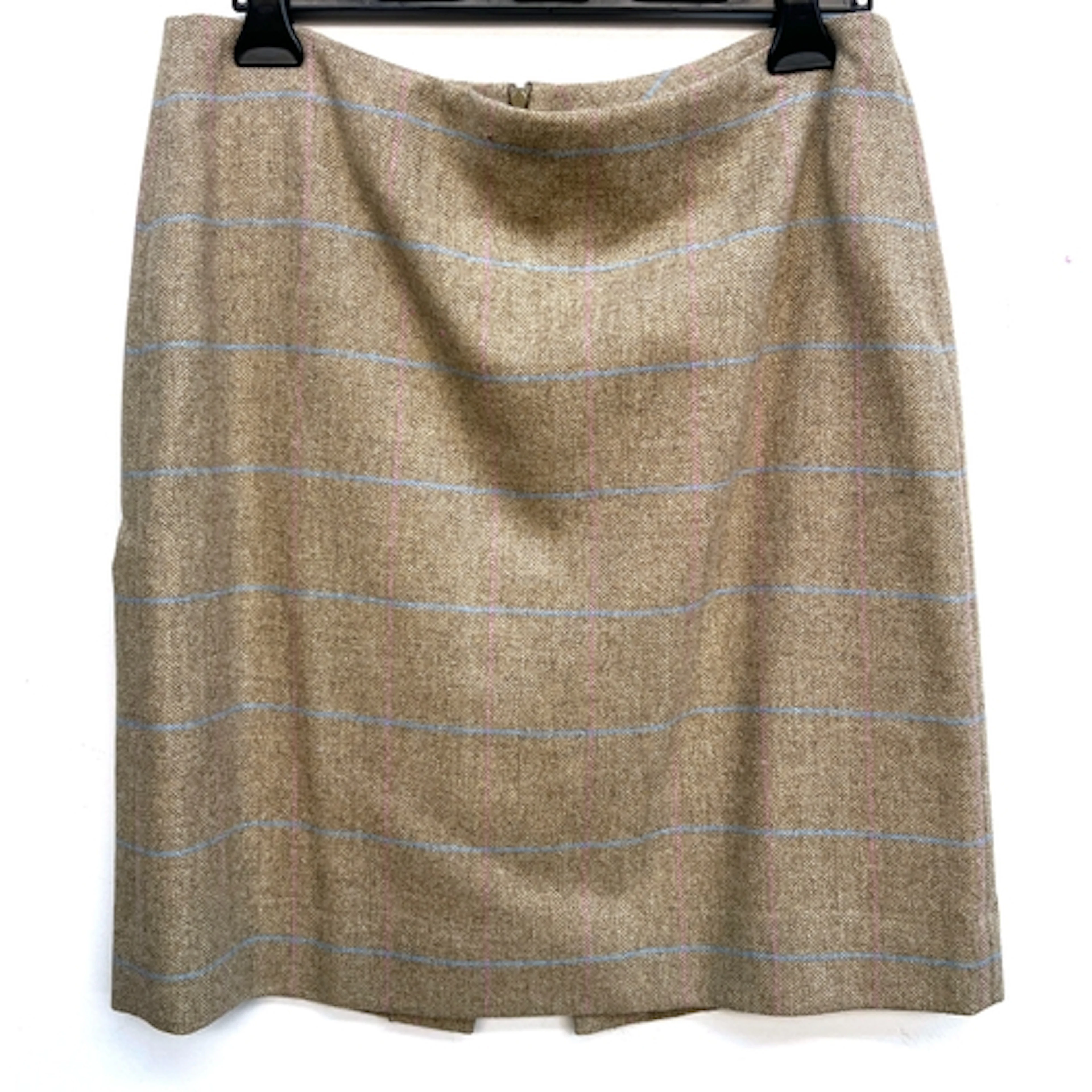 A 'Really Wild' wool skirt in a beige, pink and blue tartan,...
