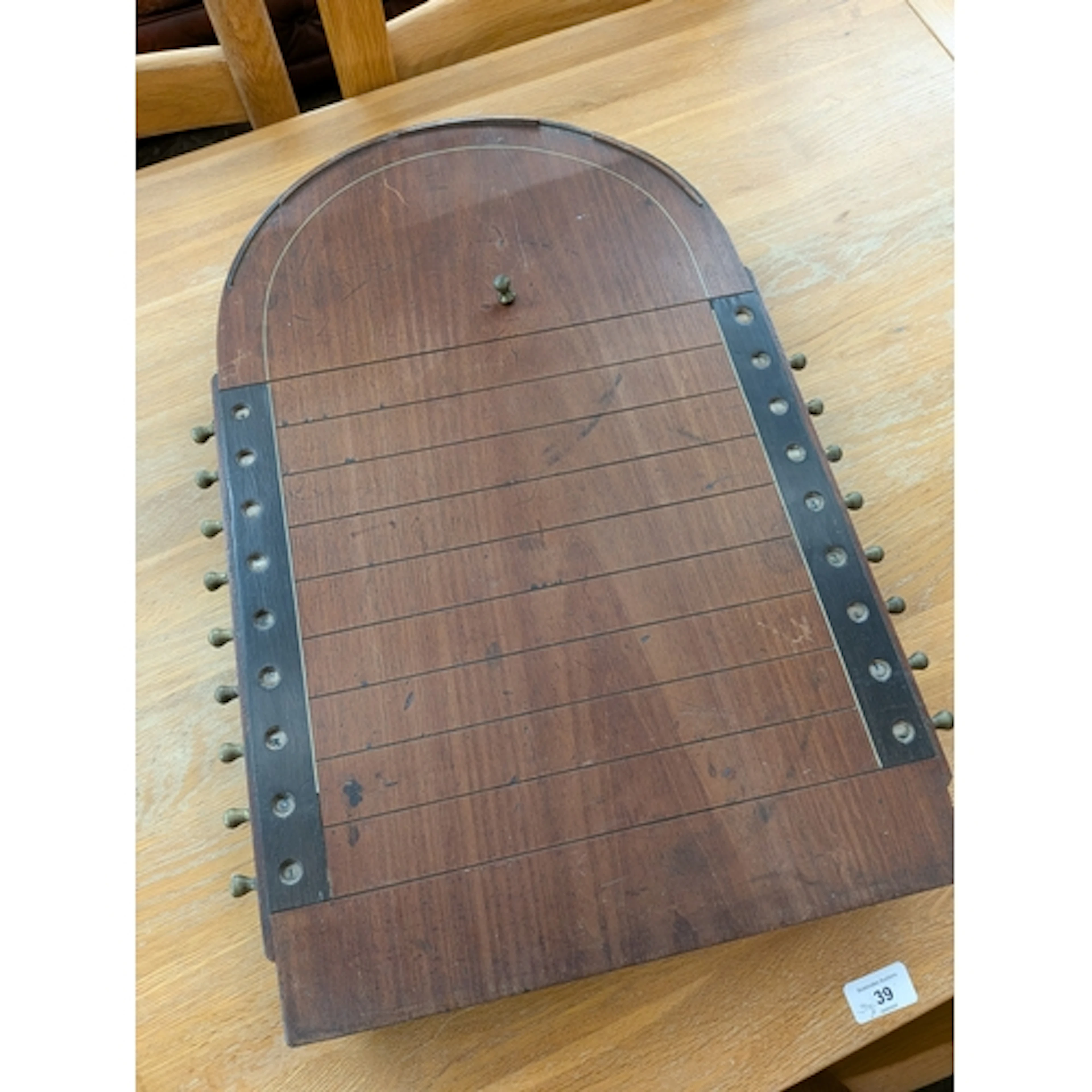 Early 20th century shove ha'penny board with mechanical scor...