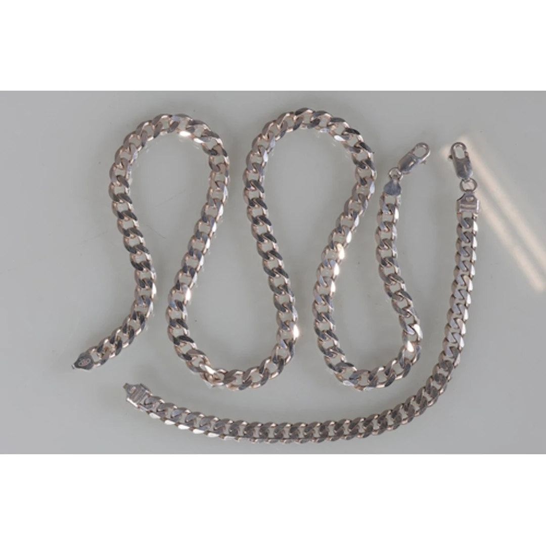 Silver curb link neck chain and matching bracelet, 90g gross...