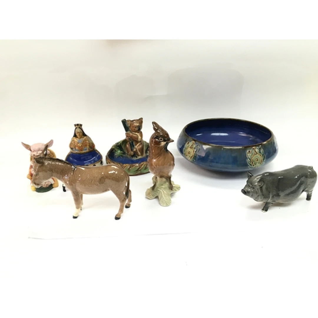 A collection of beswick and royal Doulton items. damage and ...