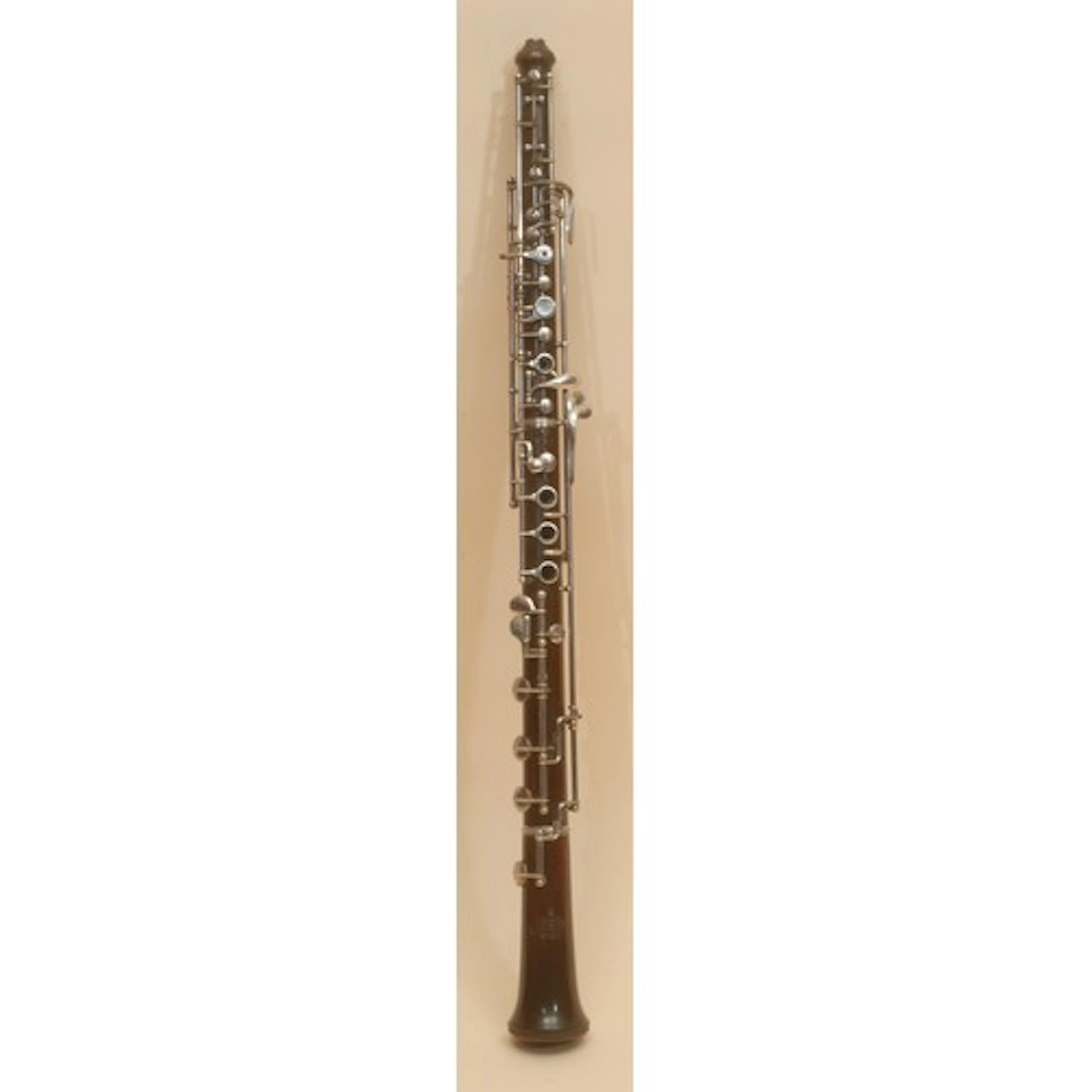 Musical Instruments - a white metal mounted hardwood oboe, R...