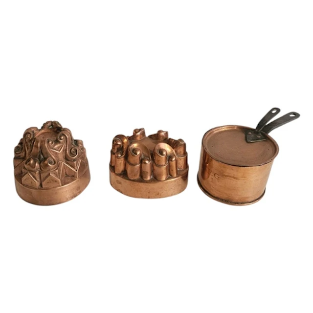 TWO VICTORIAN COPPER JELLY MOULDS To include a double scroll...