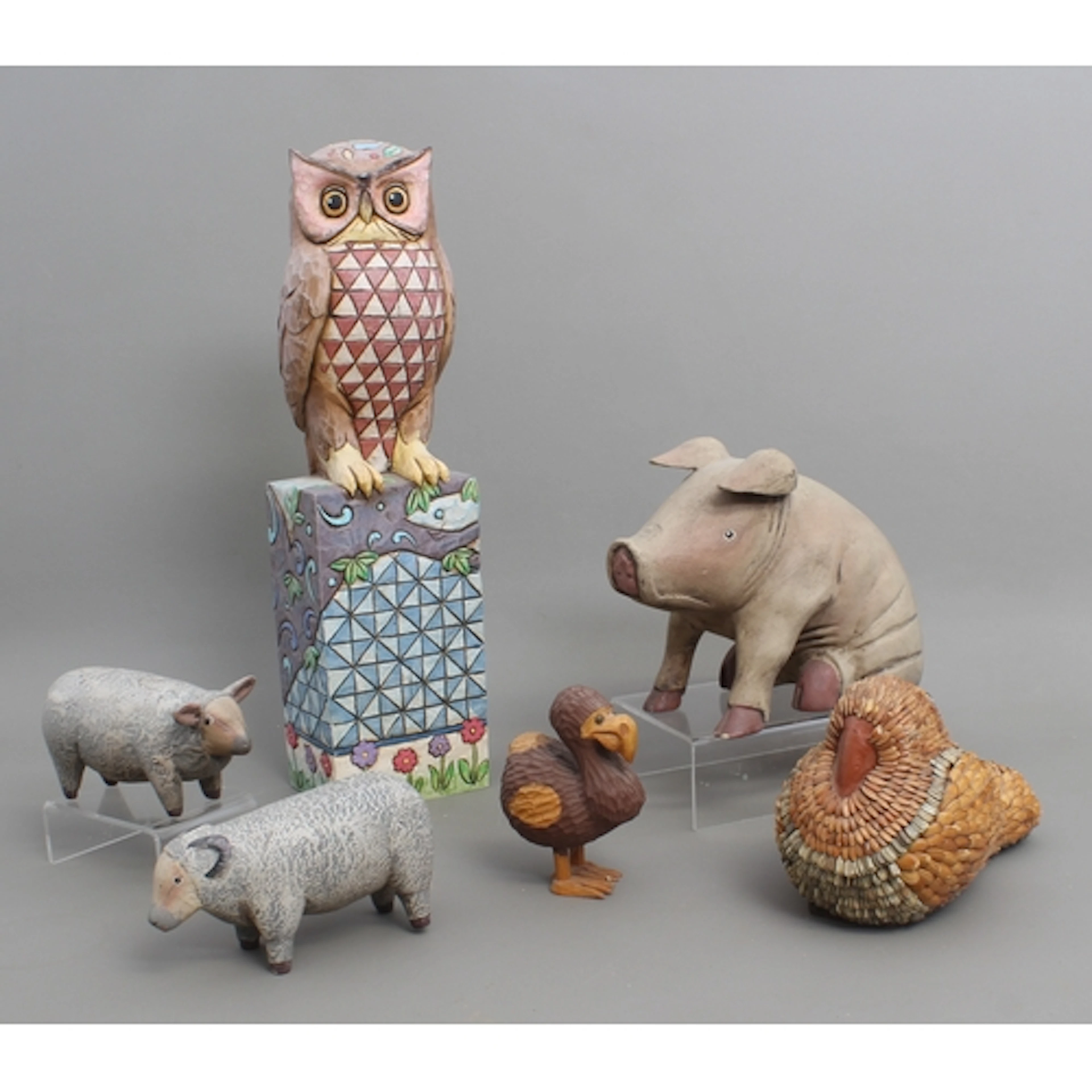 A group of decorative animal figurines - to include a Jim Sh...