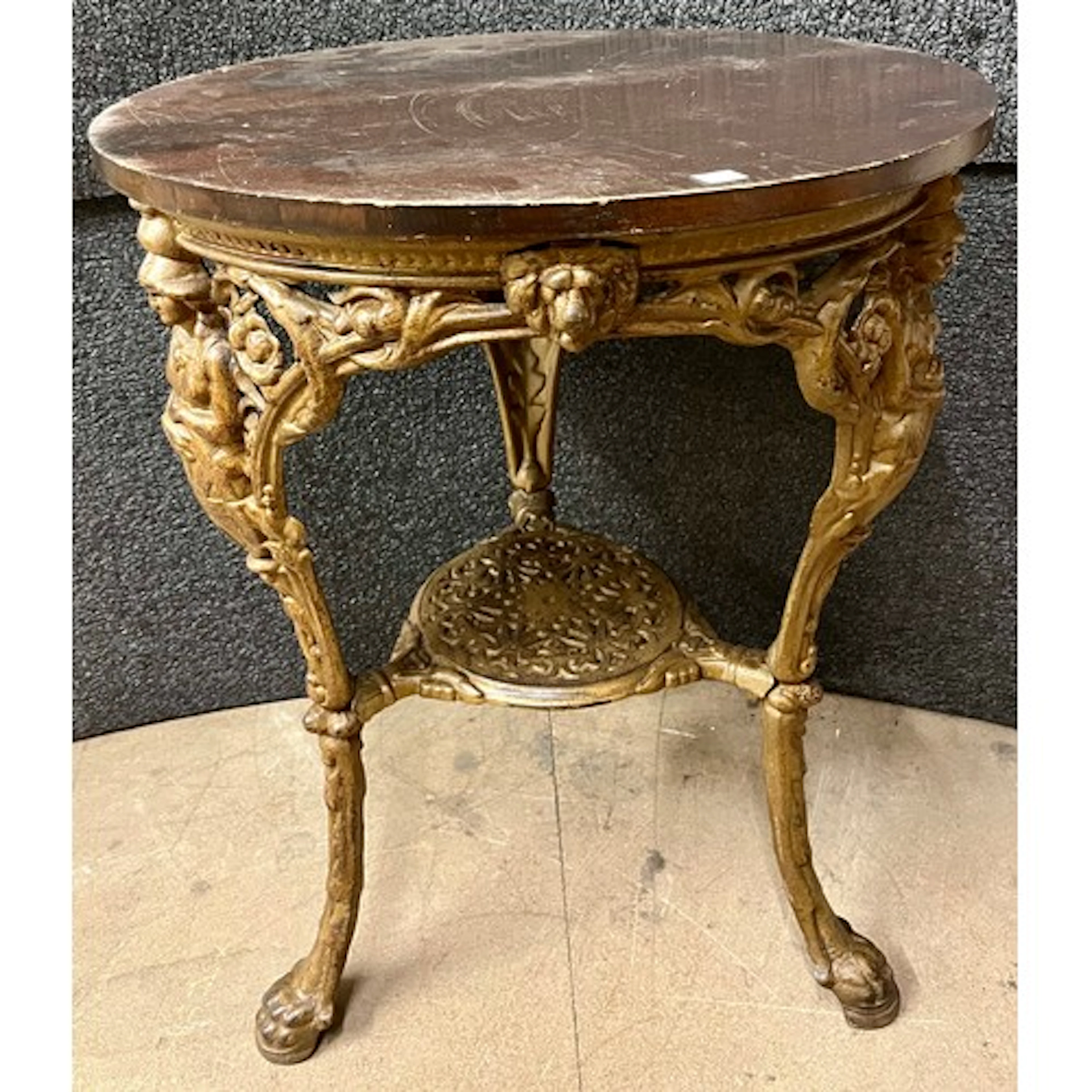 A Victorian style cast iron based pub table