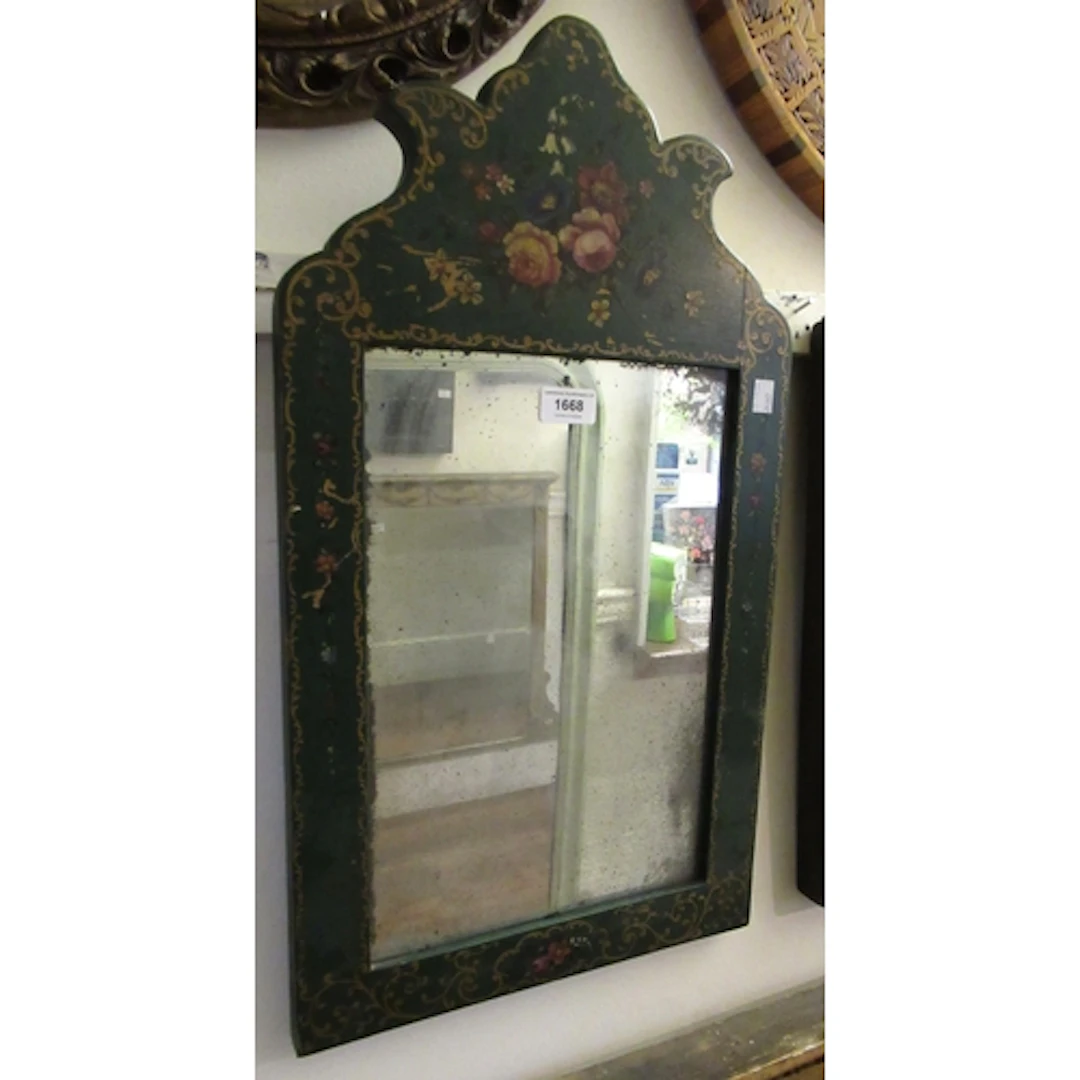 Small floral decorated green painted wall mirror with shaped...
