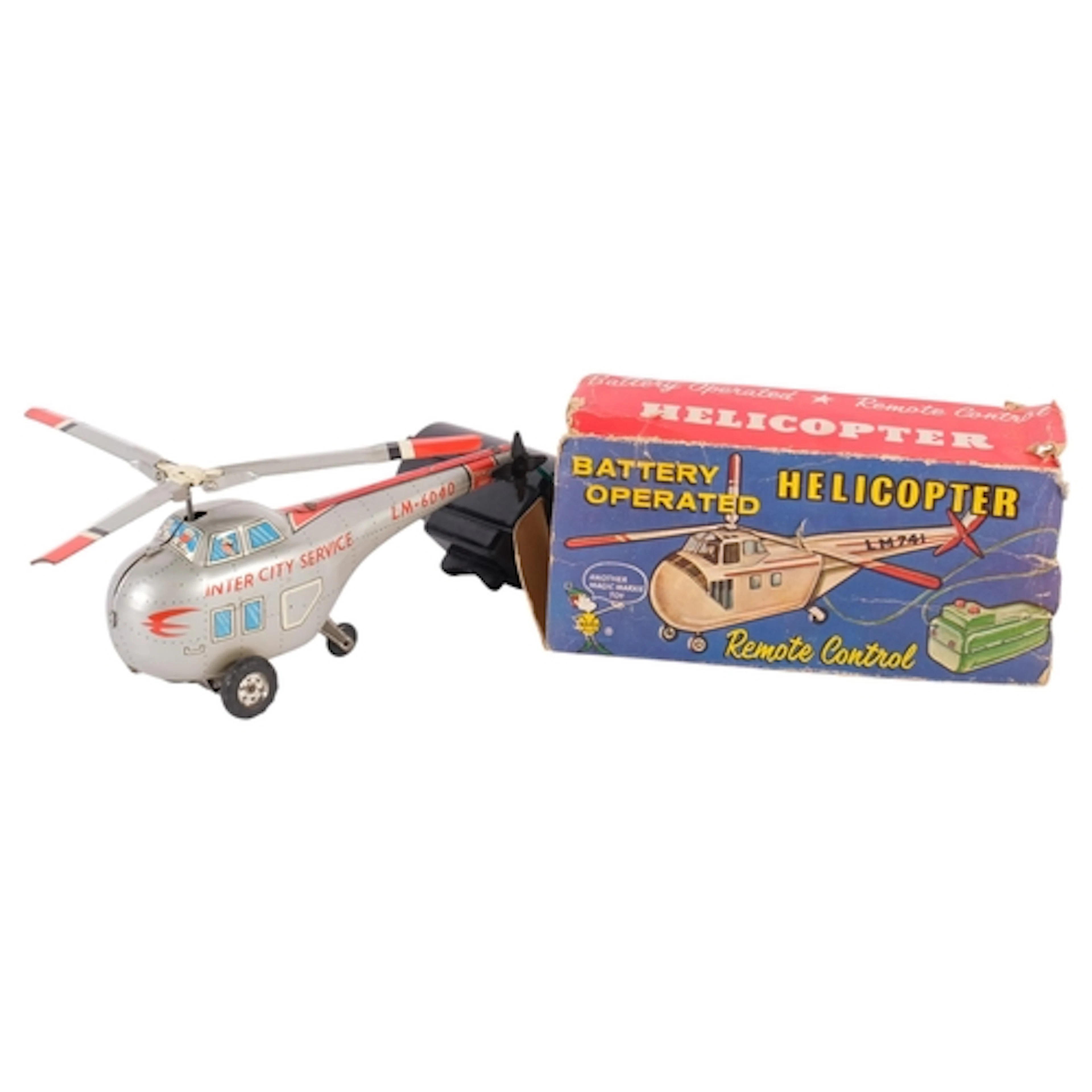 A Vintage battery-operated remote control helicopter, by Mar...