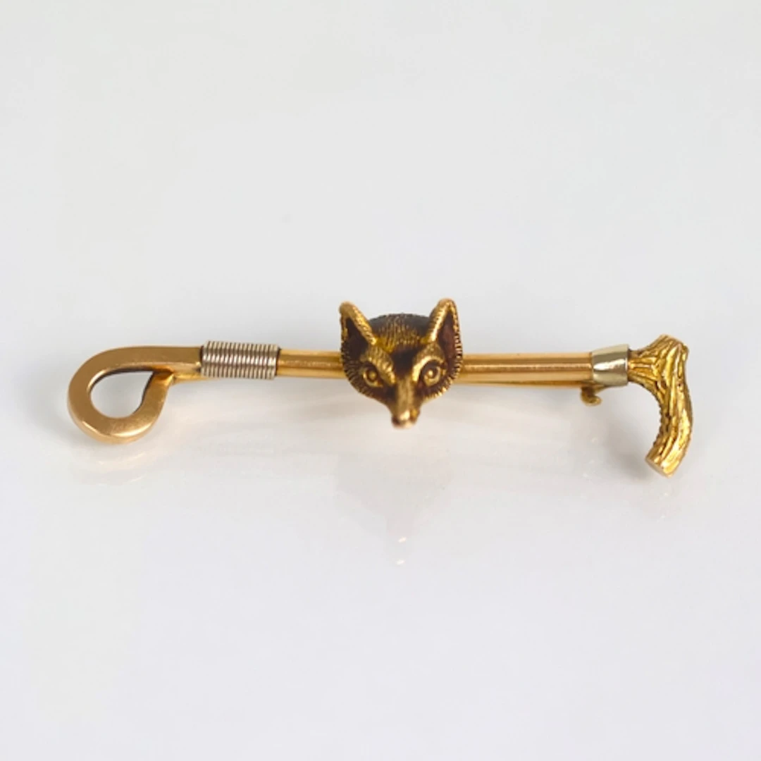 An early 20th century style yellow metal brooch, possibly co...