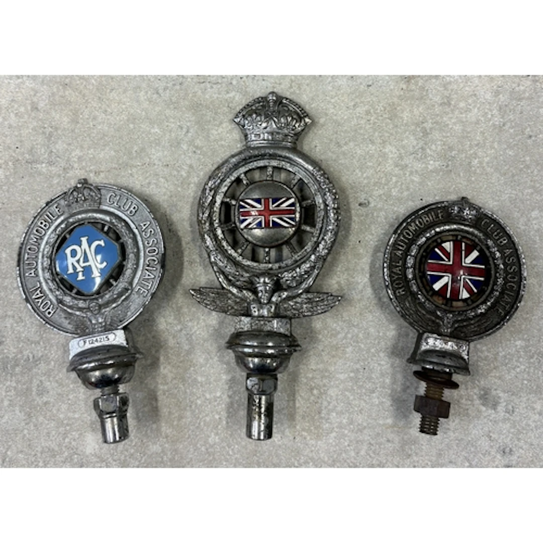A collection of three RAC bonnet mascots. Est. £20 - £30.
