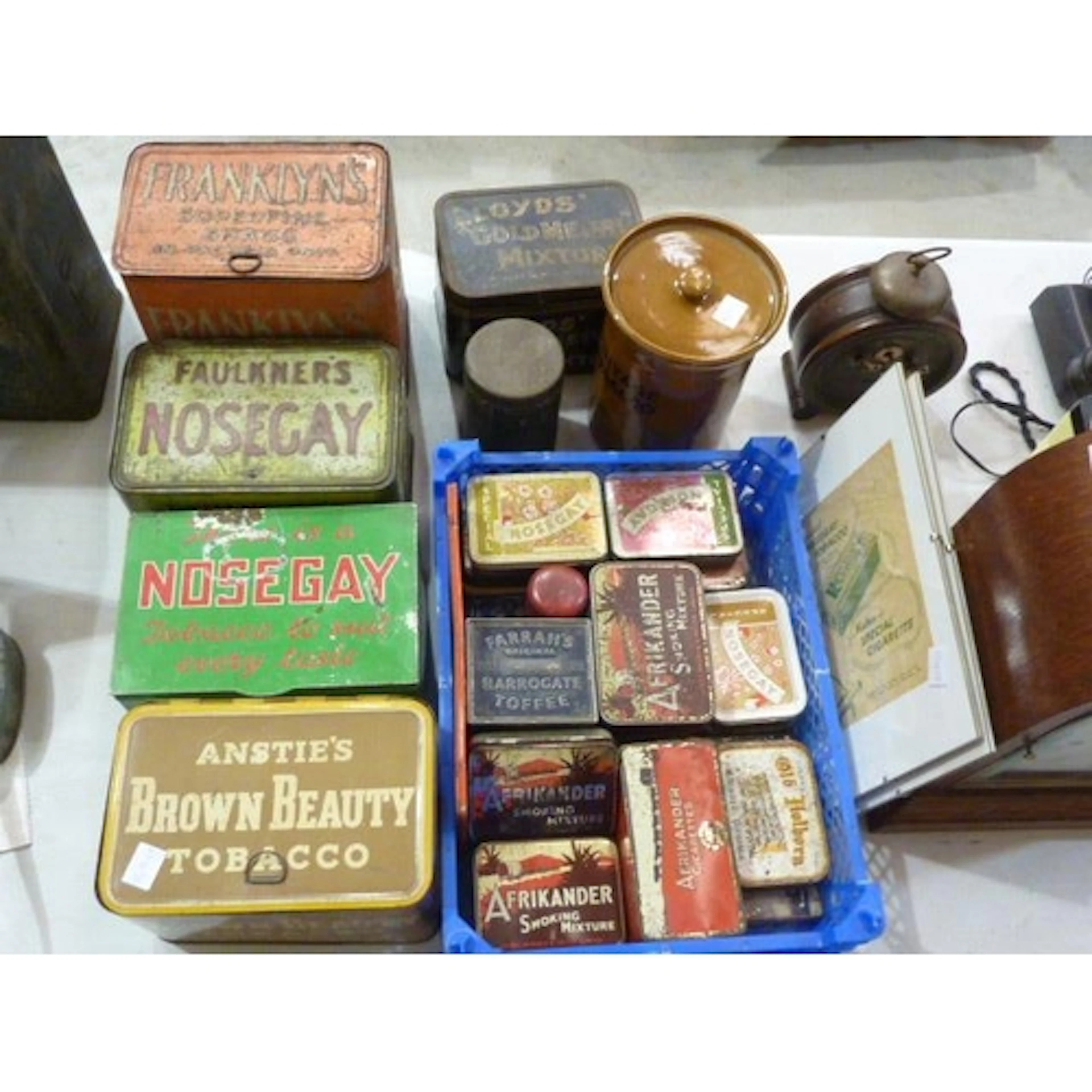 A collection of mainly vintage tobacco tins, including Faulk...