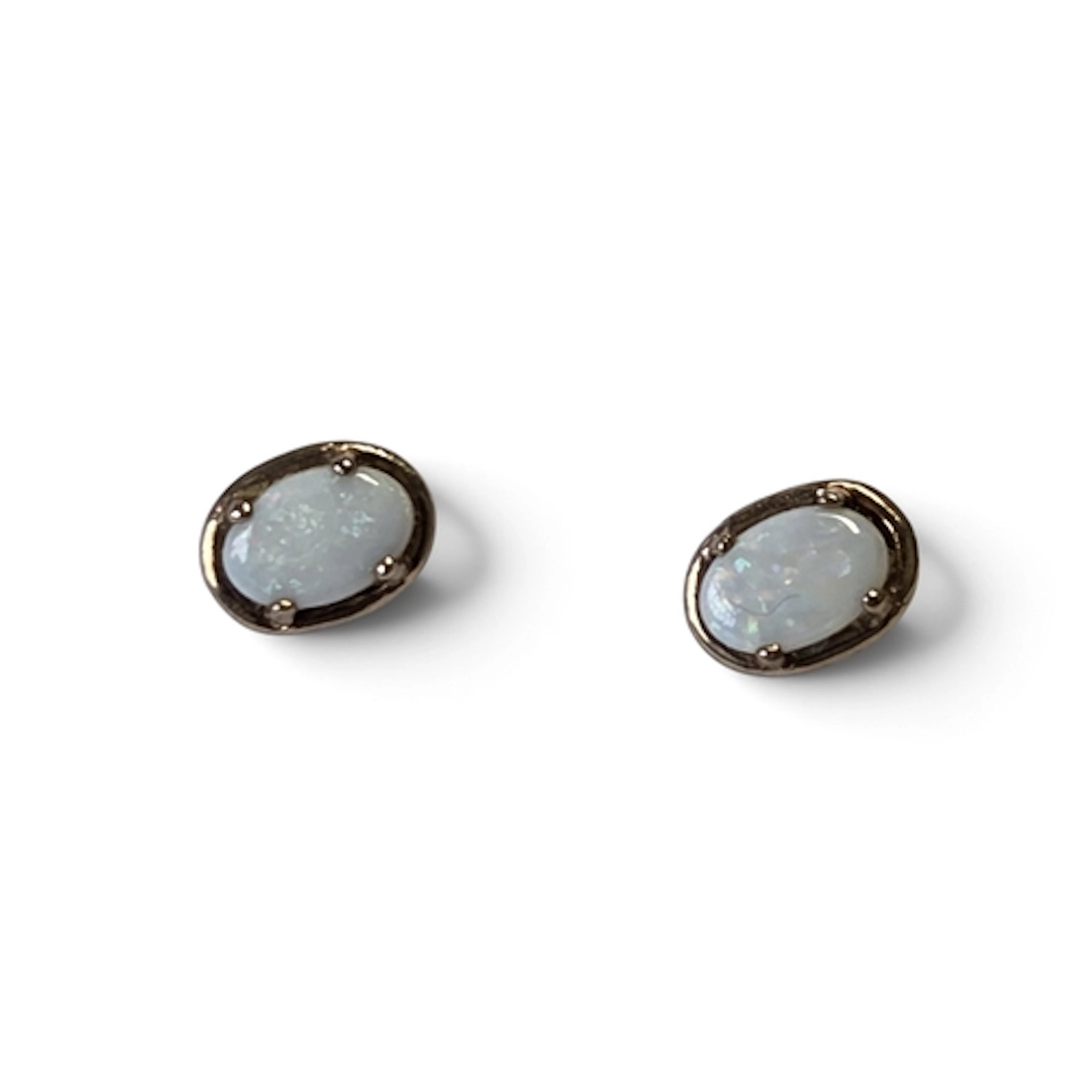 A pair of 9ct Gold and Opal oval Earrings.