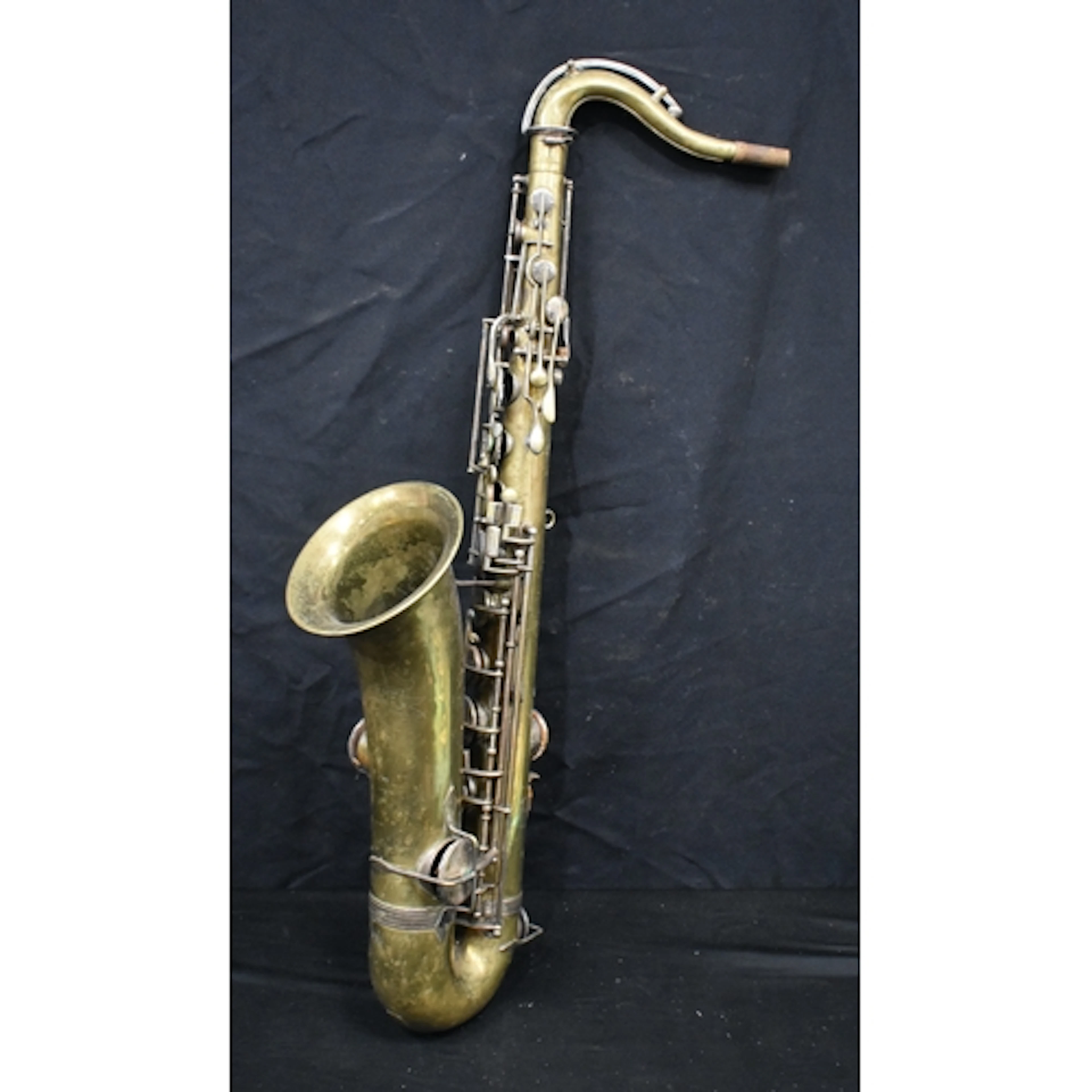 An Albert of London vintage brass saxophone 83 cm.
