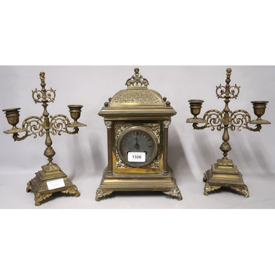 Edwardian brass three piece clock garniture, with a French t...
