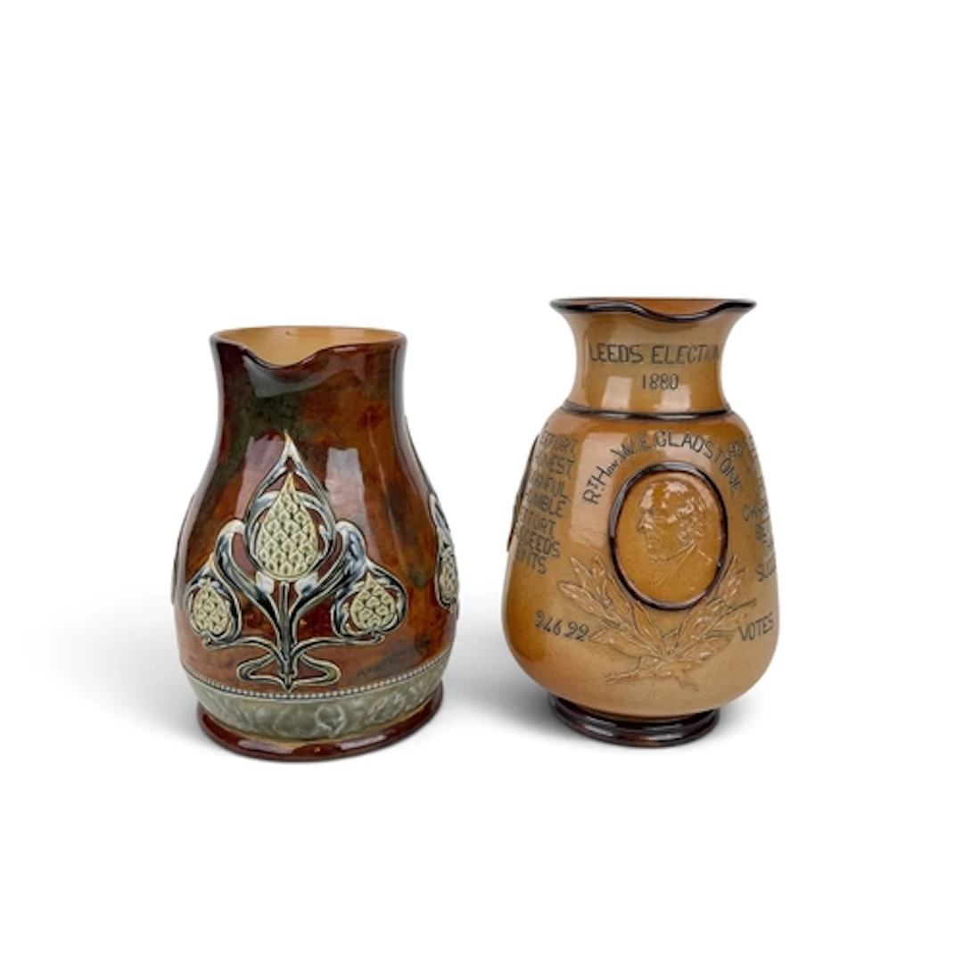 A DOULTON LAMBETH SALT-GLAZED STONEWARE JUG COMMEMORATING TH...