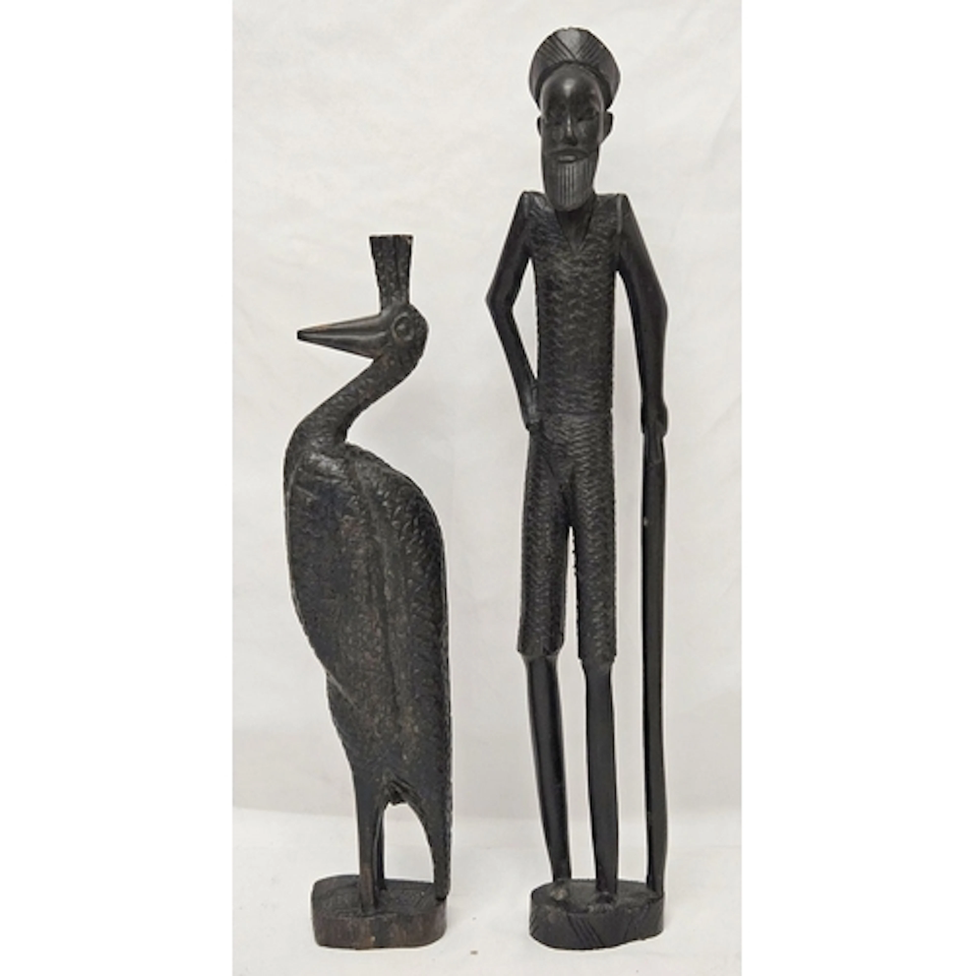 2 Carved Hardwood Figurines, elongated gentleman with walkin...