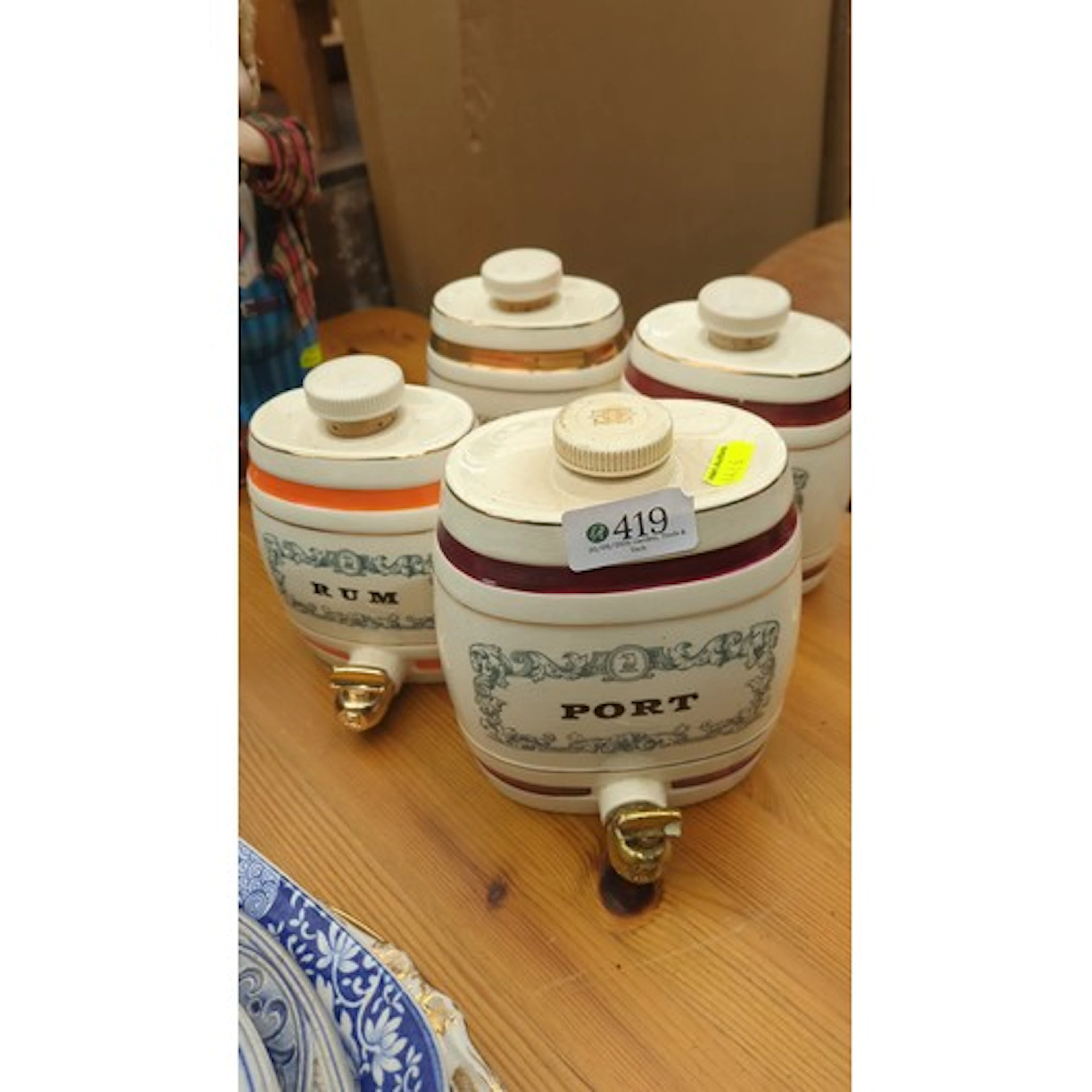 A group of Royal Victoria Wade England pottery spirit barrel...
