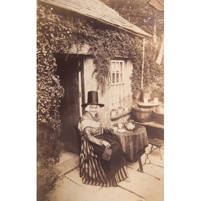 A late 19th century photograph album, circa 1890s, inscribed...