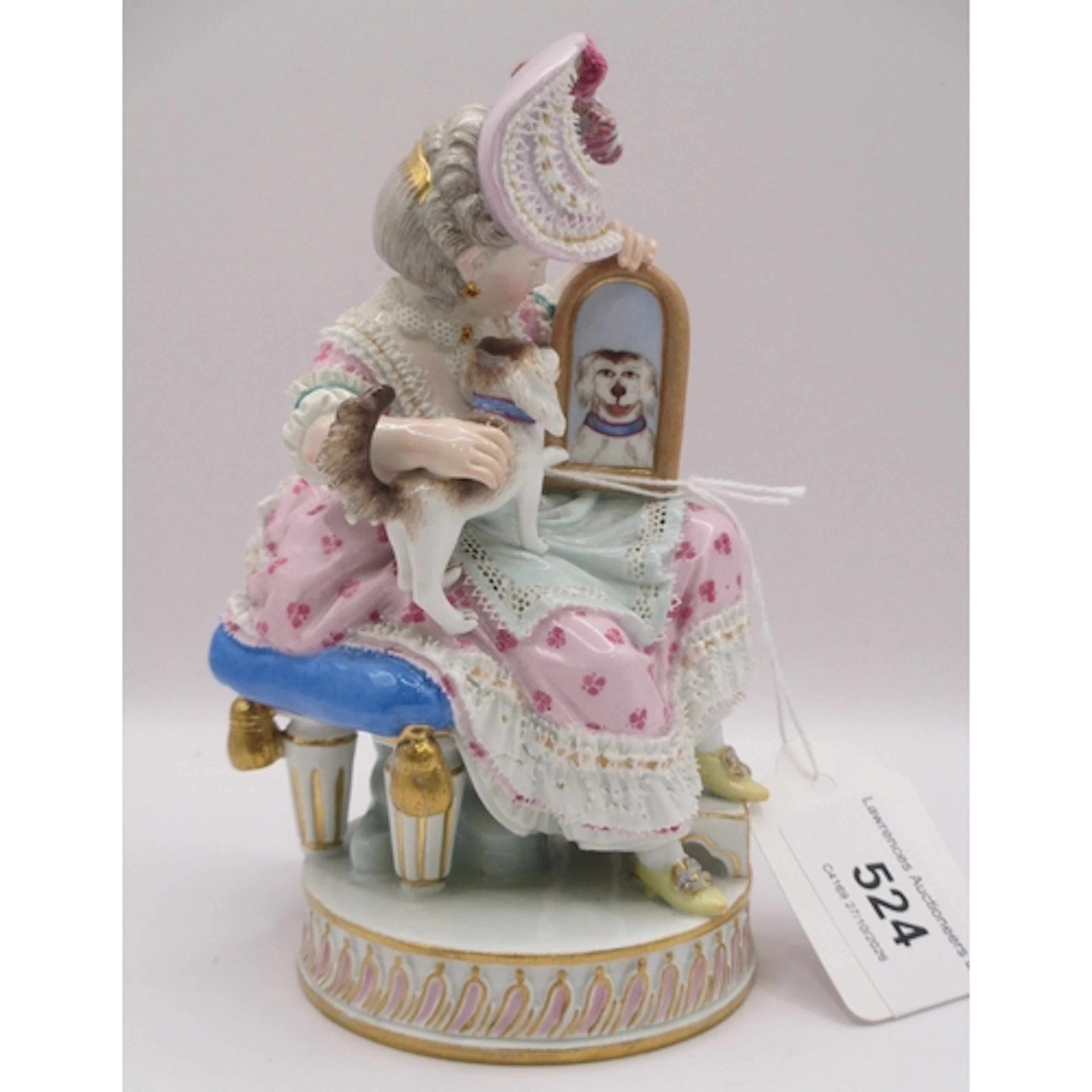 19th Century Meissen figure of a seated girl with puppy and ...