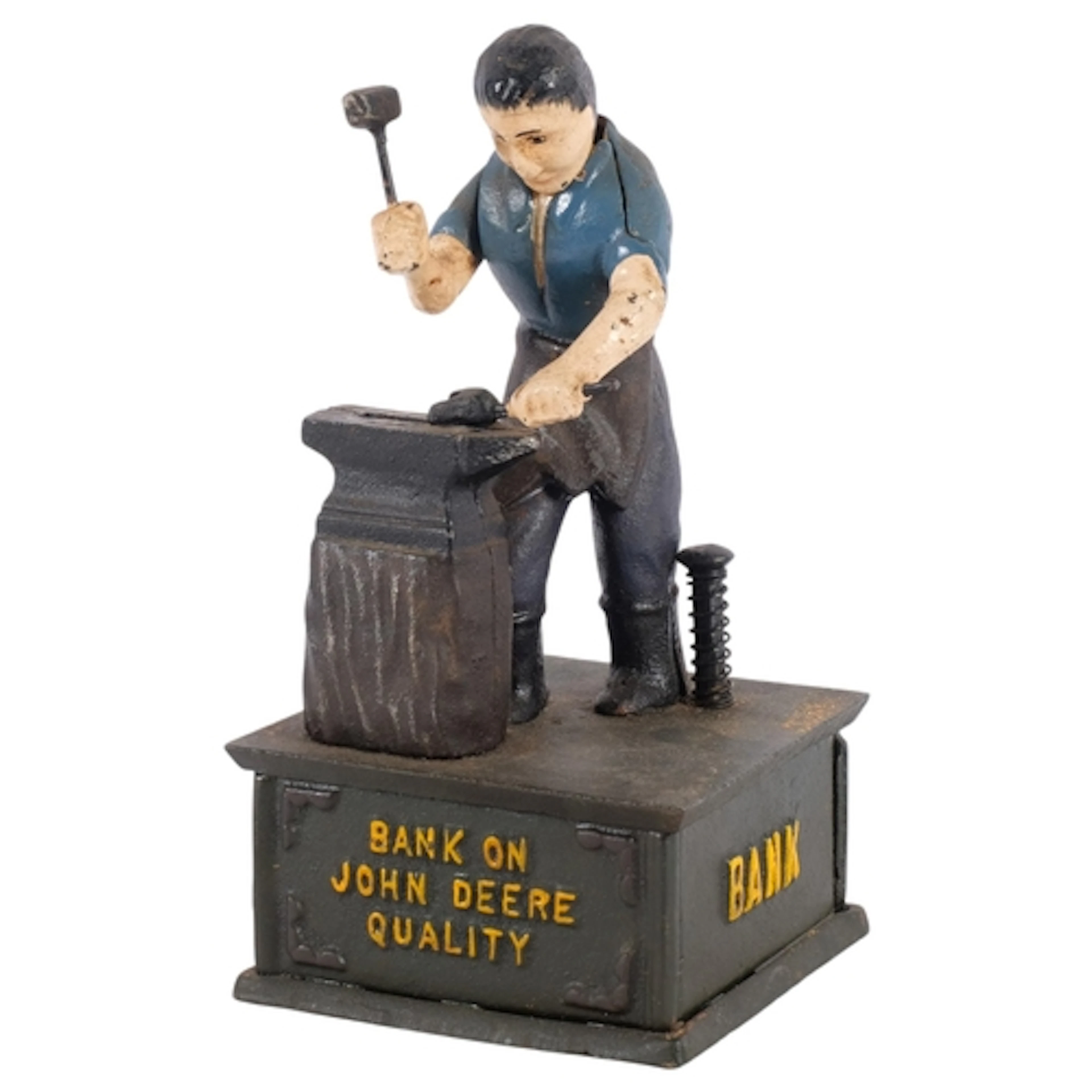 A novelty mechanical blacksmith figure money box, inscribed ...