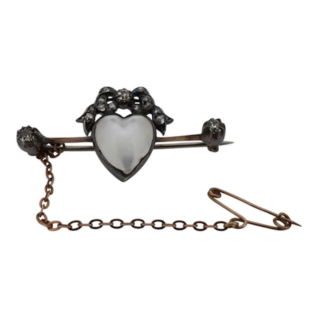 A Victorian moonstone and diamond bar brooch, late 19th cent...