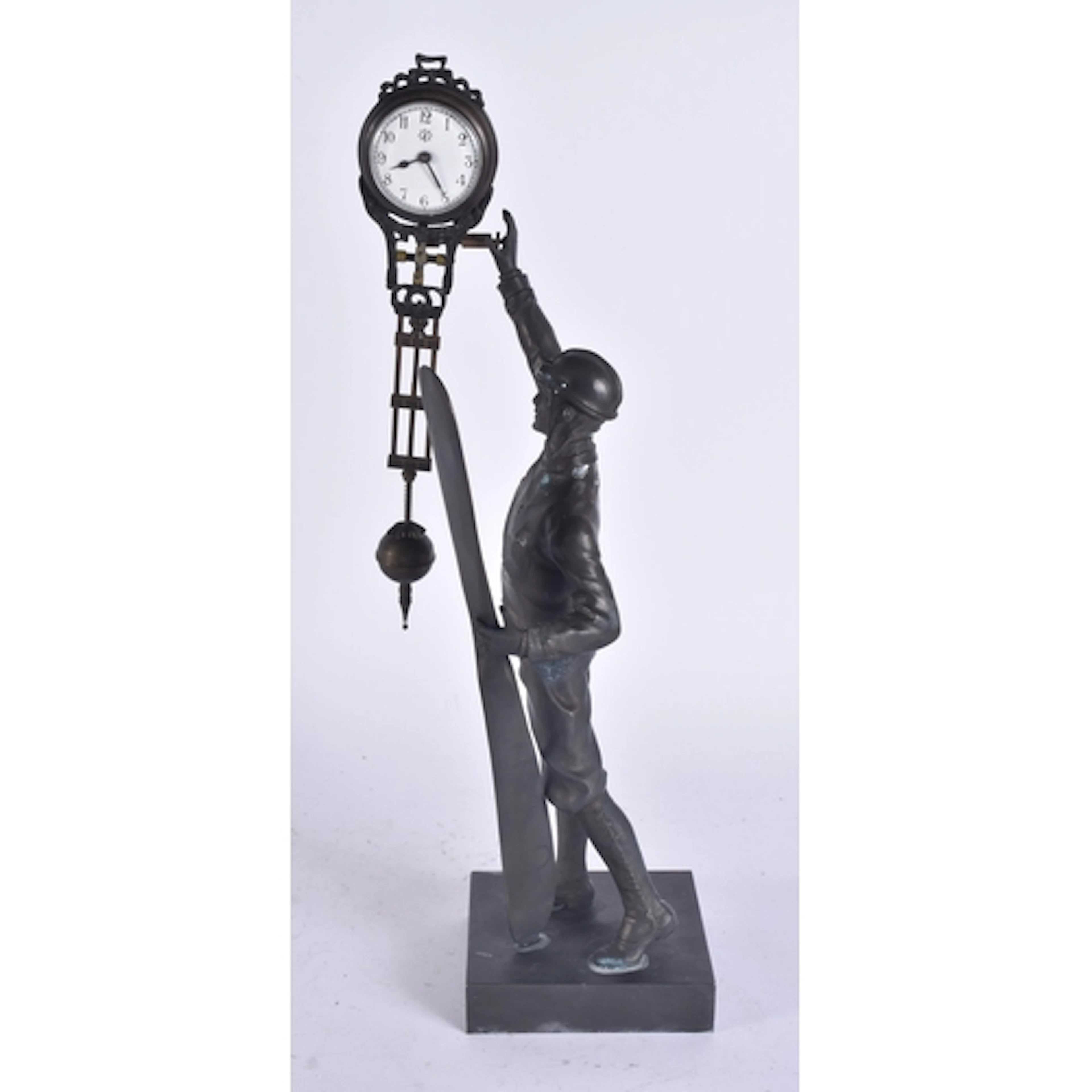 AN AIRMAN SWING MYSTERY CLOCK. 36 cm high.