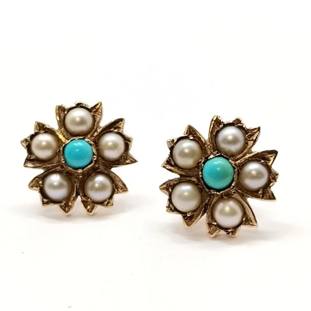 Unmarked (touch tests as) gold floral earrings set with pear...