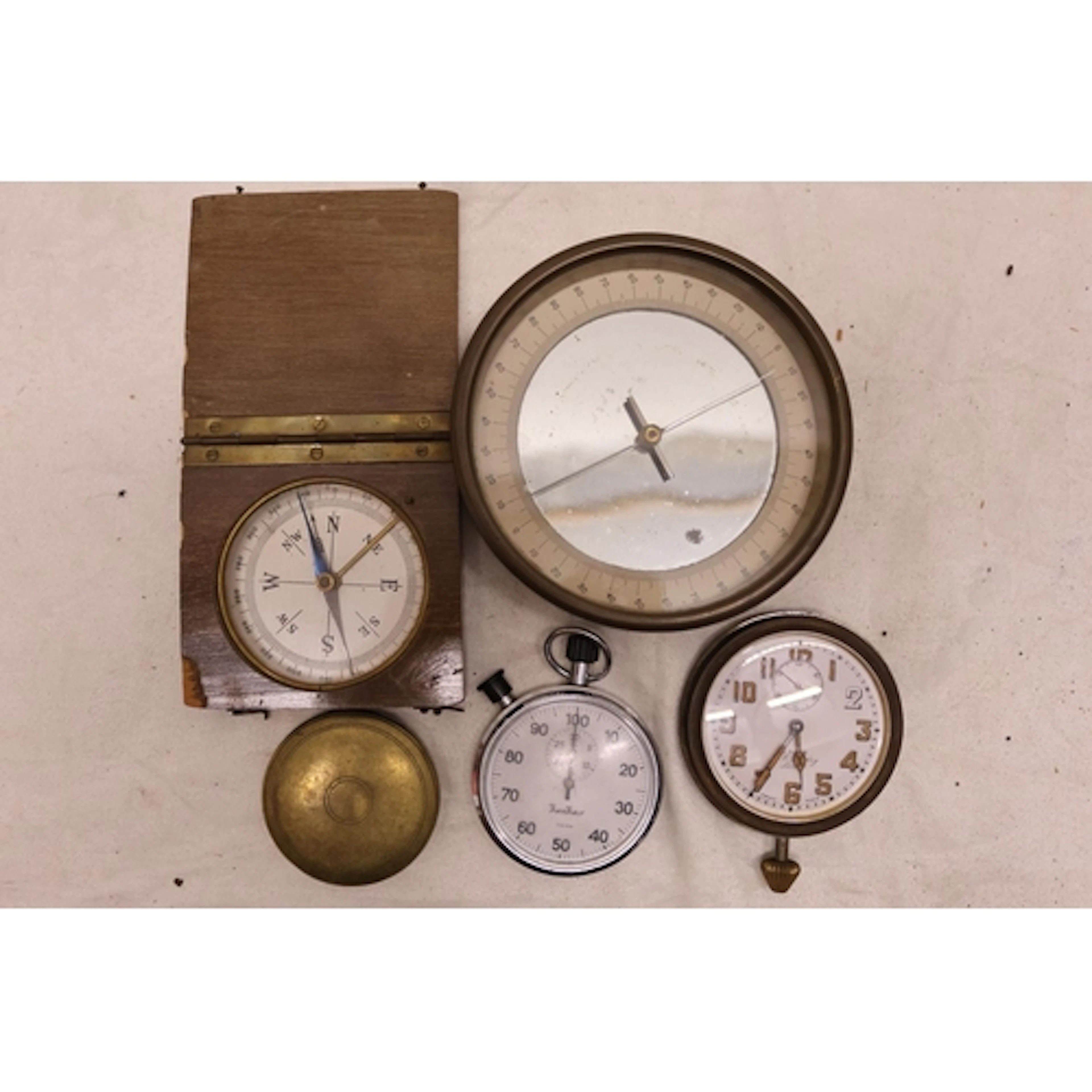 Three compasses, a J B Yarsley 8 day dash clock with militar...