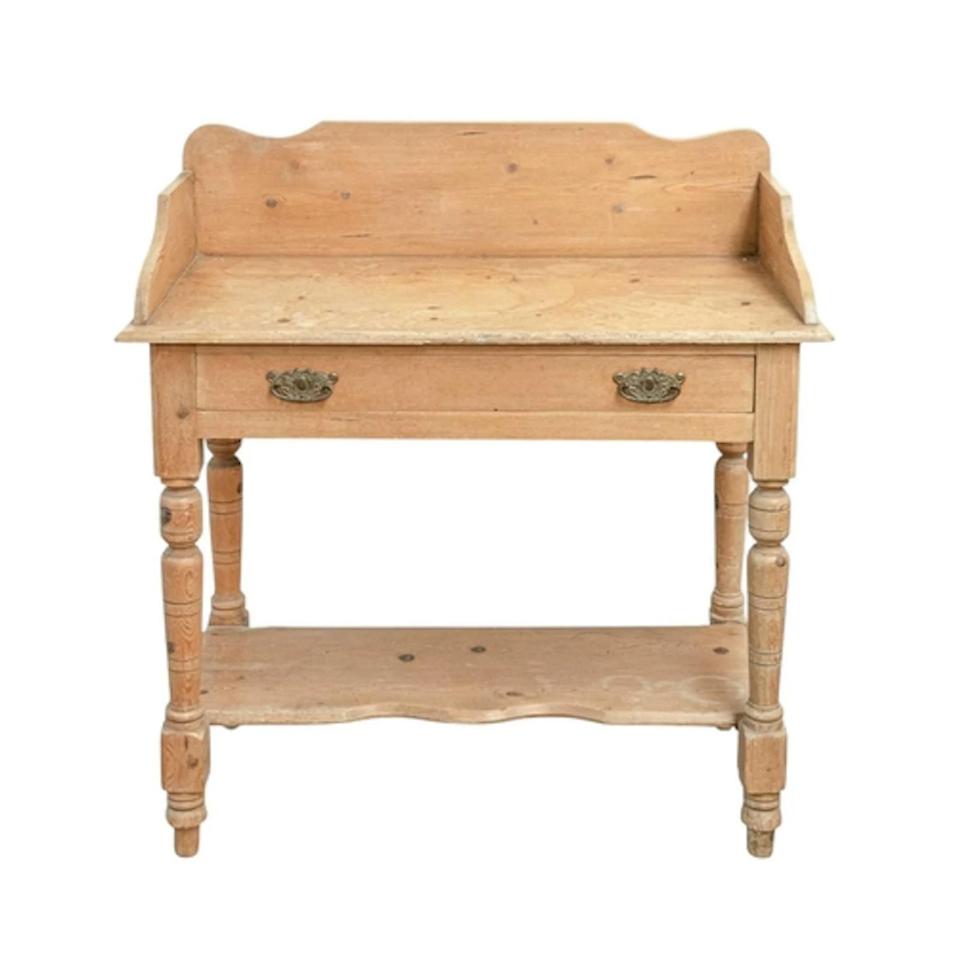 A Victorian pine tray top washstand. Fitted with a long draw...