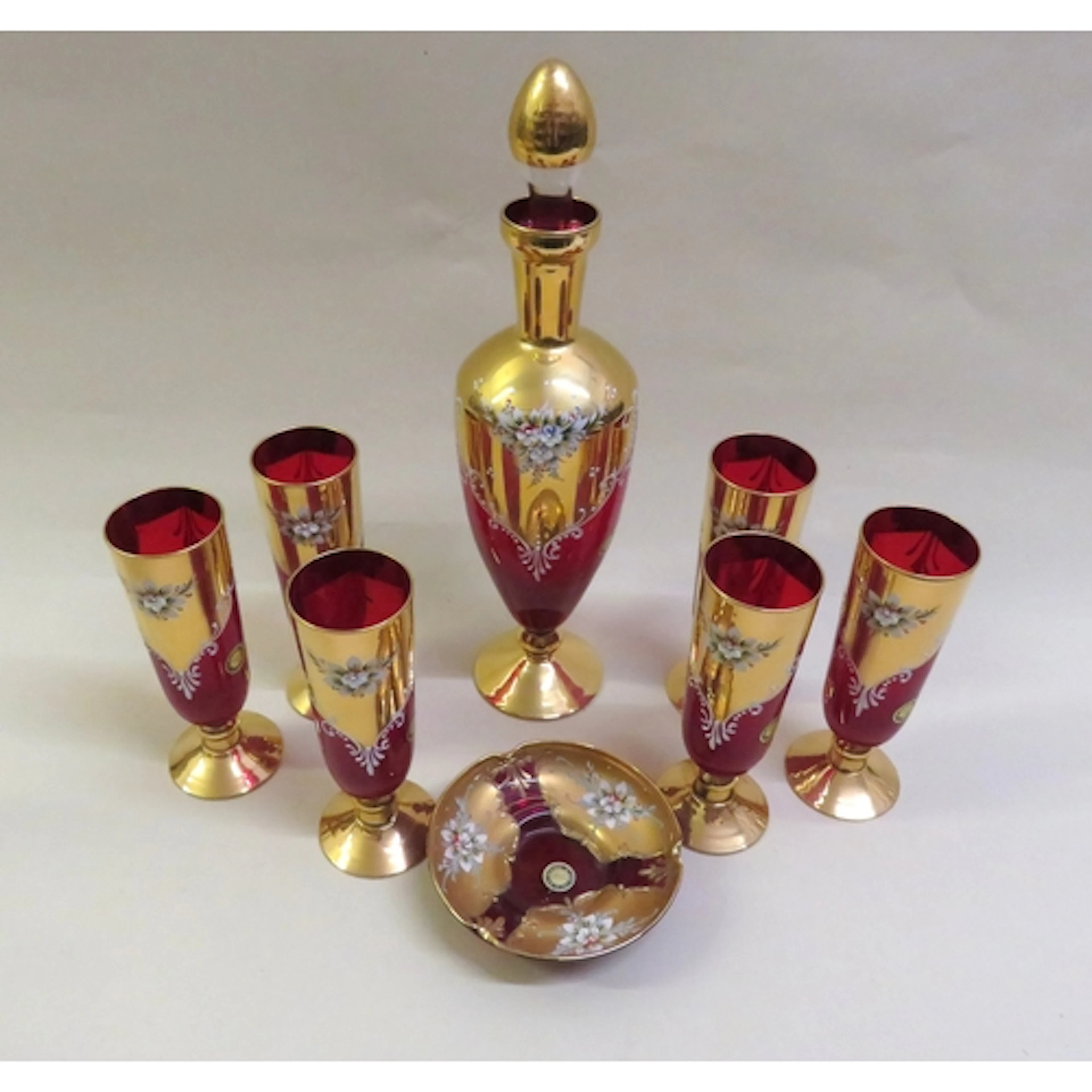 Quantity of Murano gold decorated red glassware, together wi...