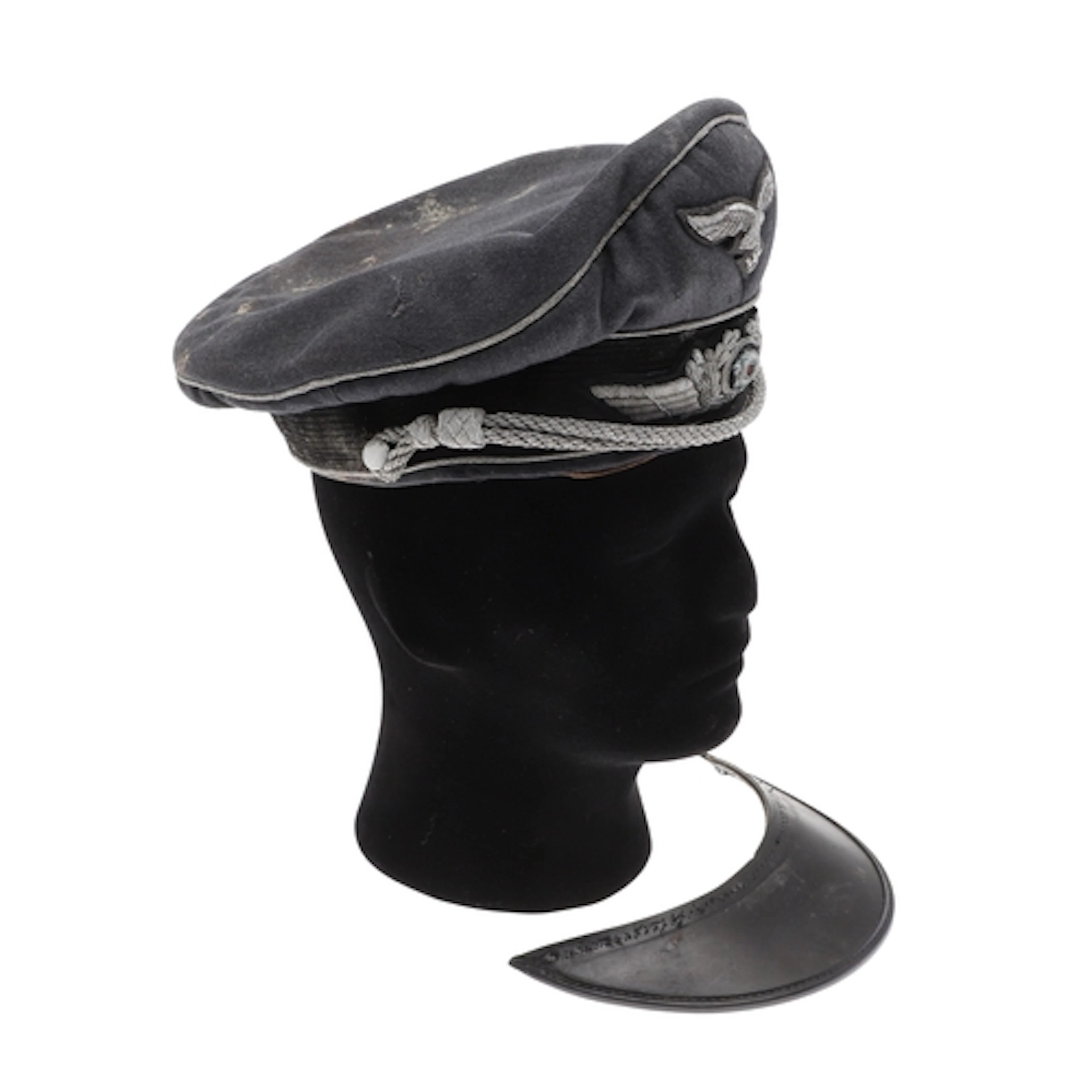 A SECOND WORLD WAR GERMAN LUFTWAFFE OFFICER'S PEAKED CAP. A ...