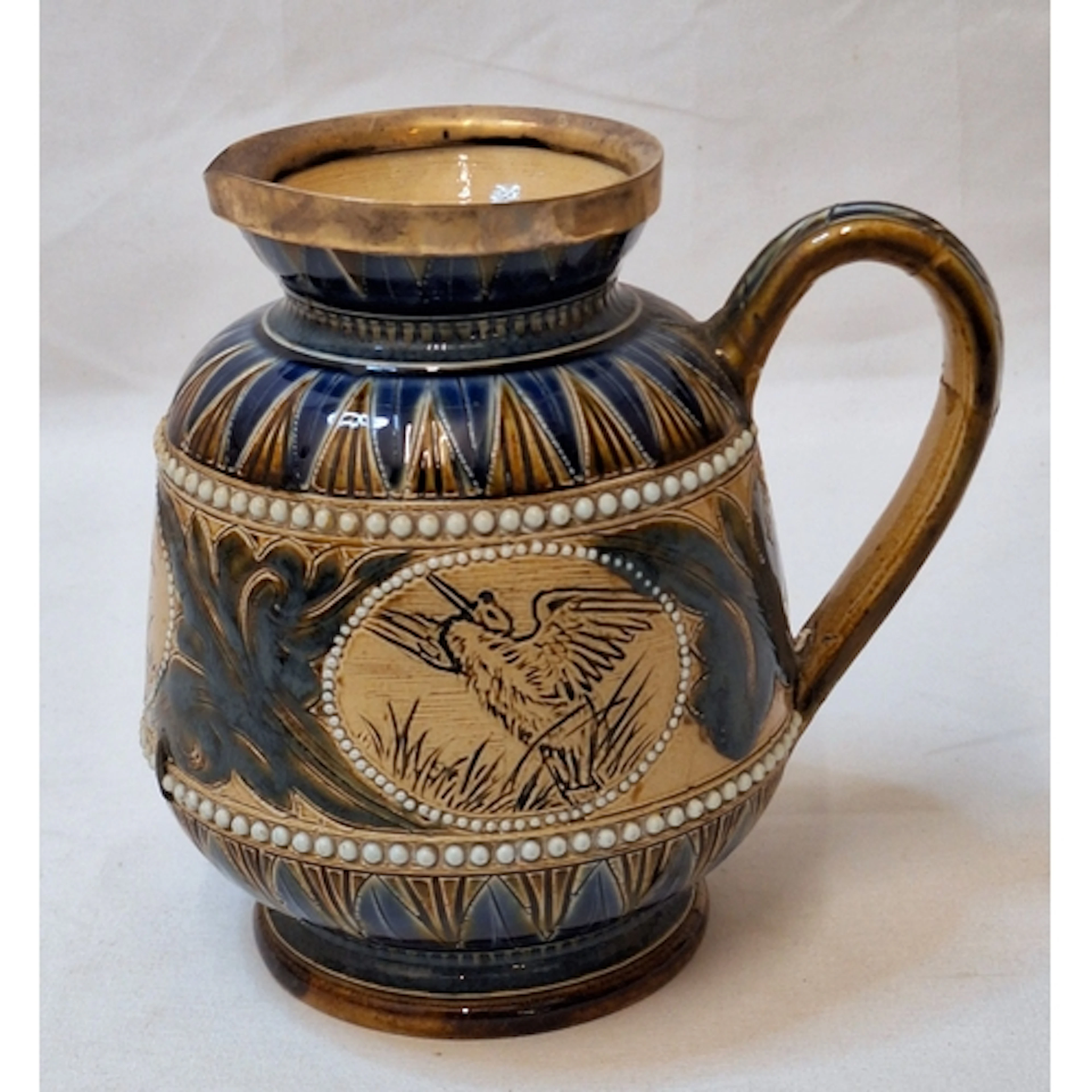 Antique Doulton Lambeth Stoneware Jug with hallmarked silver...