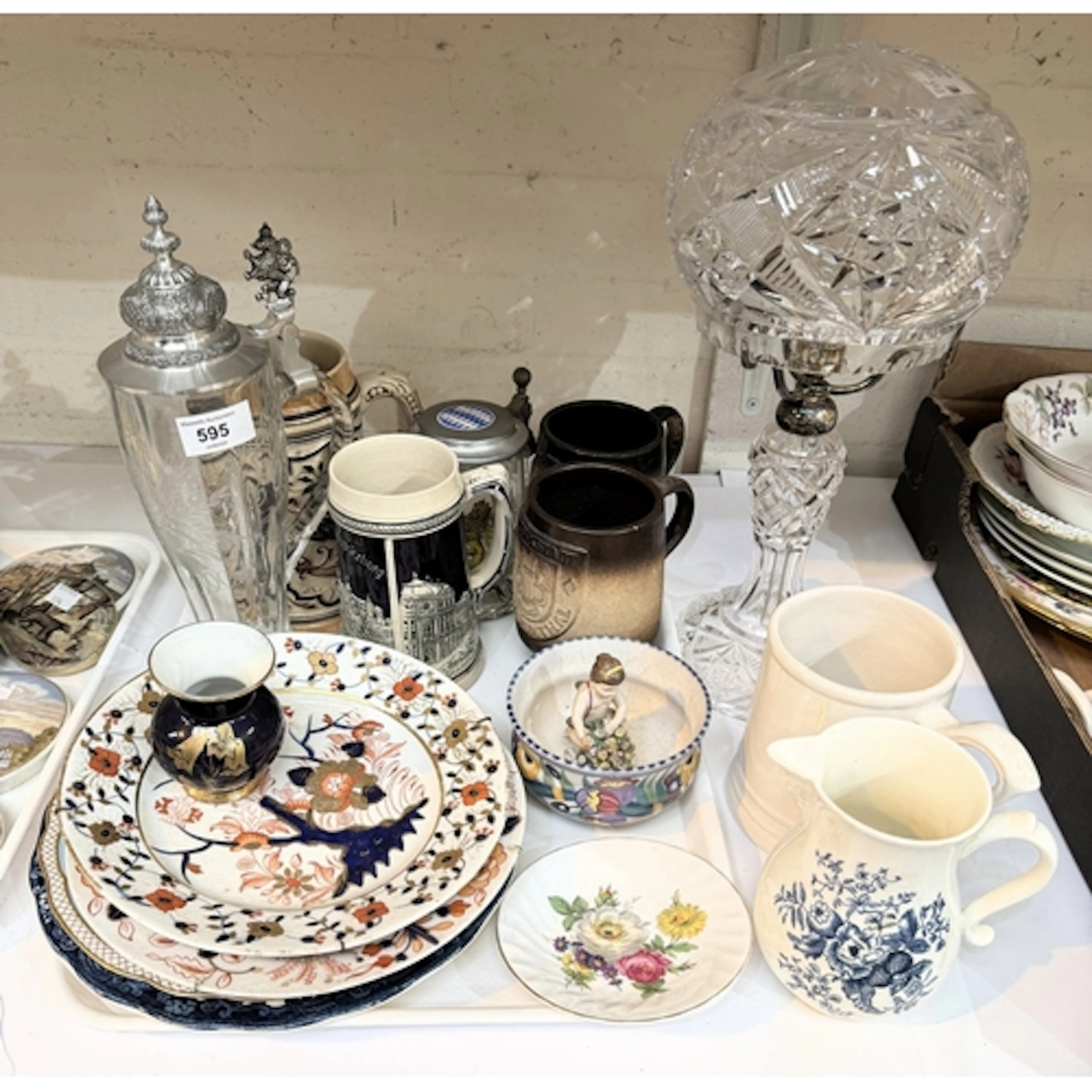 A selection of decorative plates, steins, cutglass table lam...