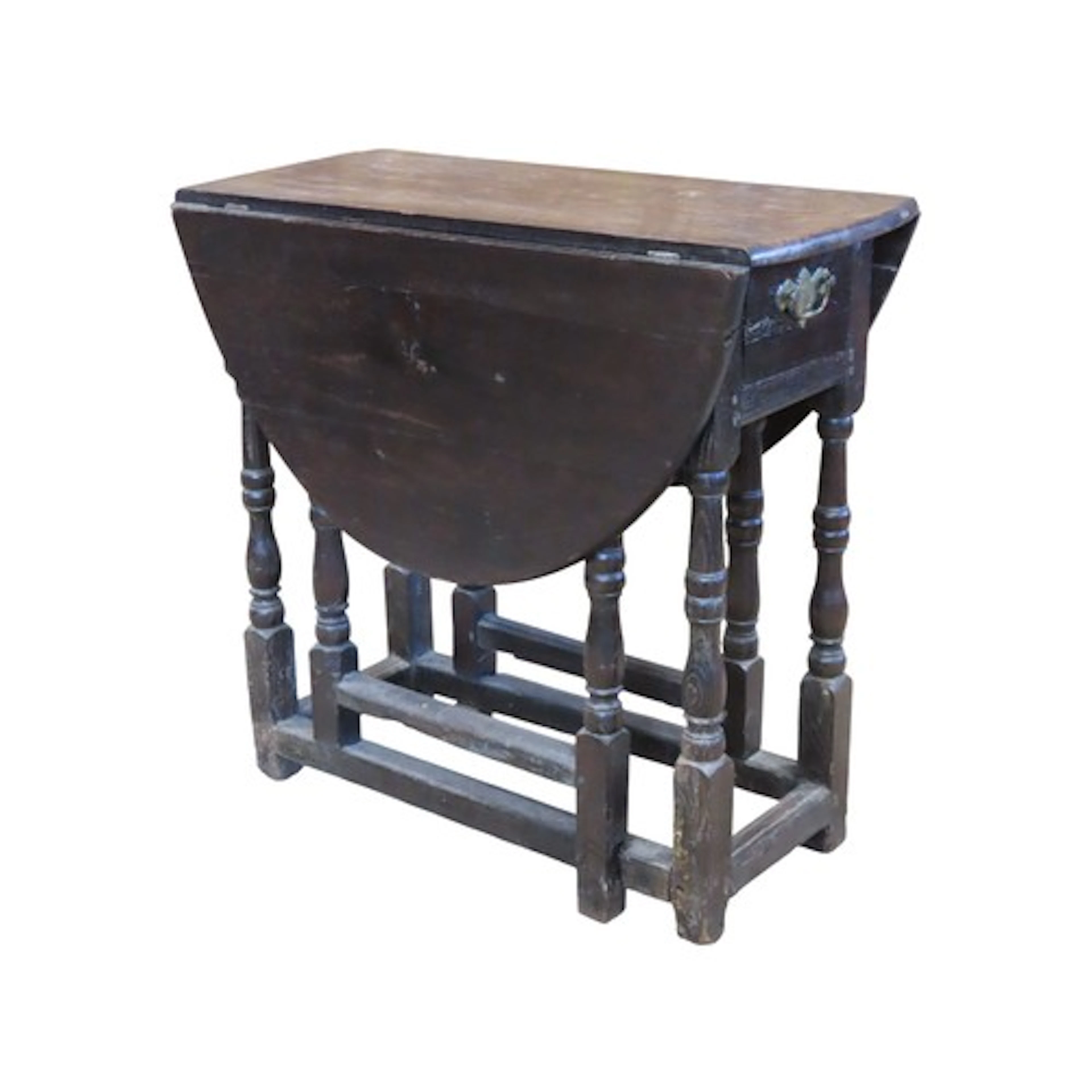 A small antique oak oval drop leaf gateleg table with frieze...